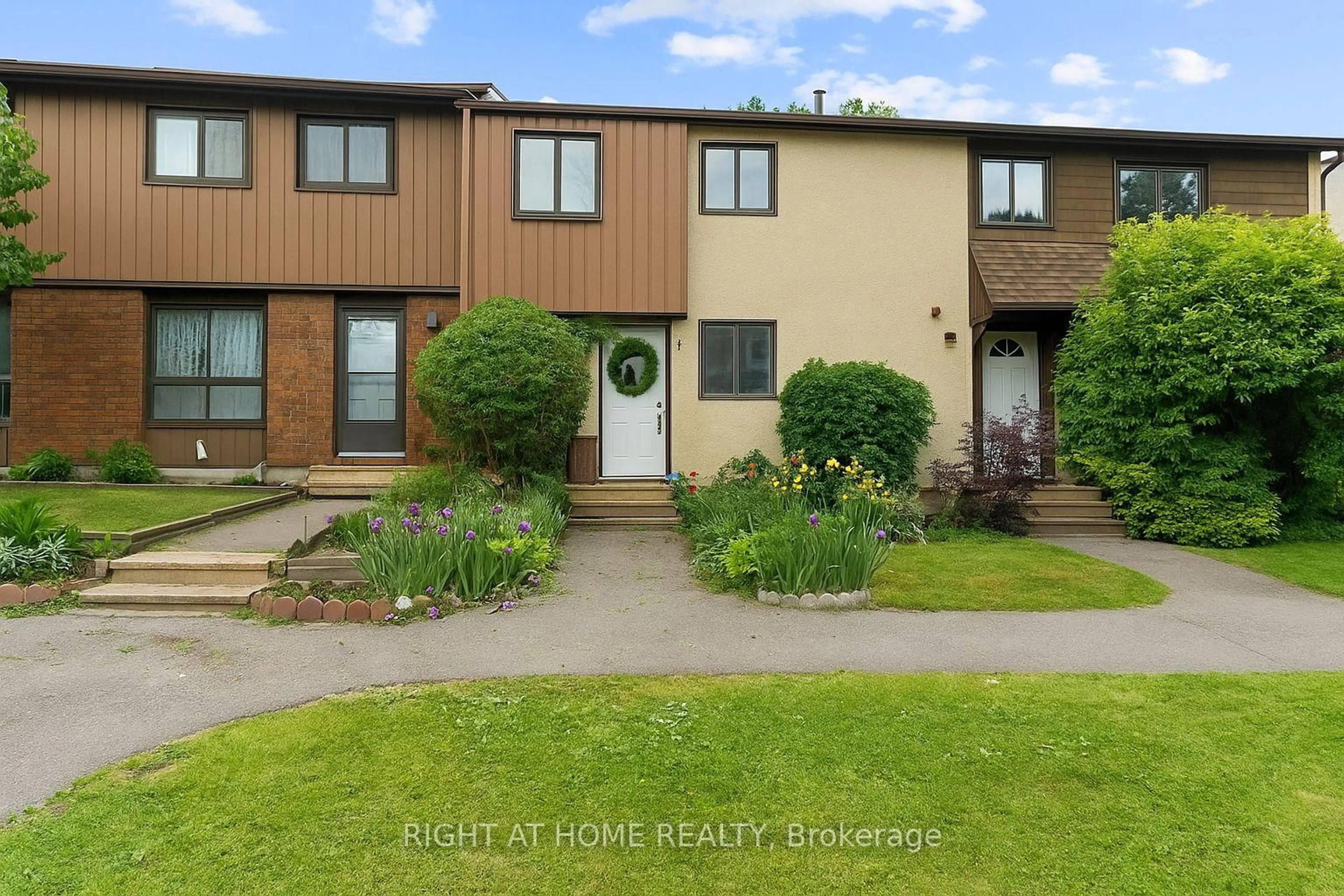 A pic from outside/outdoor area/front of a property/back of a property/a pic from drone, street for 12B LARKSHIRE Lane, Ottawa Ontario K2J 1Y6