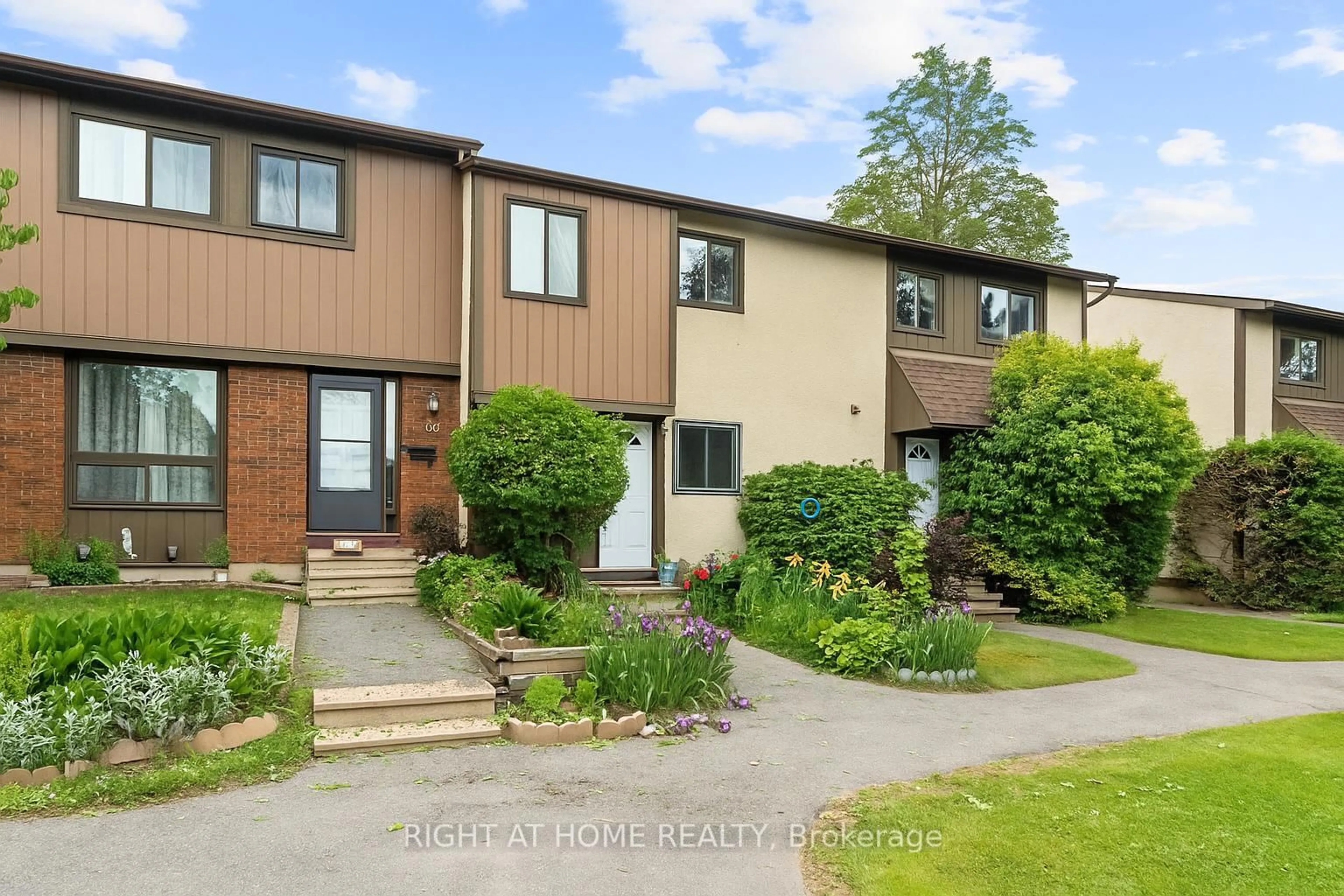 A pic from outside/outdoor area/front of a property/back of a property/a pic from drone, street for 12B LARKSHIRE Lane, Ottawa Ontario K2J 1Y6