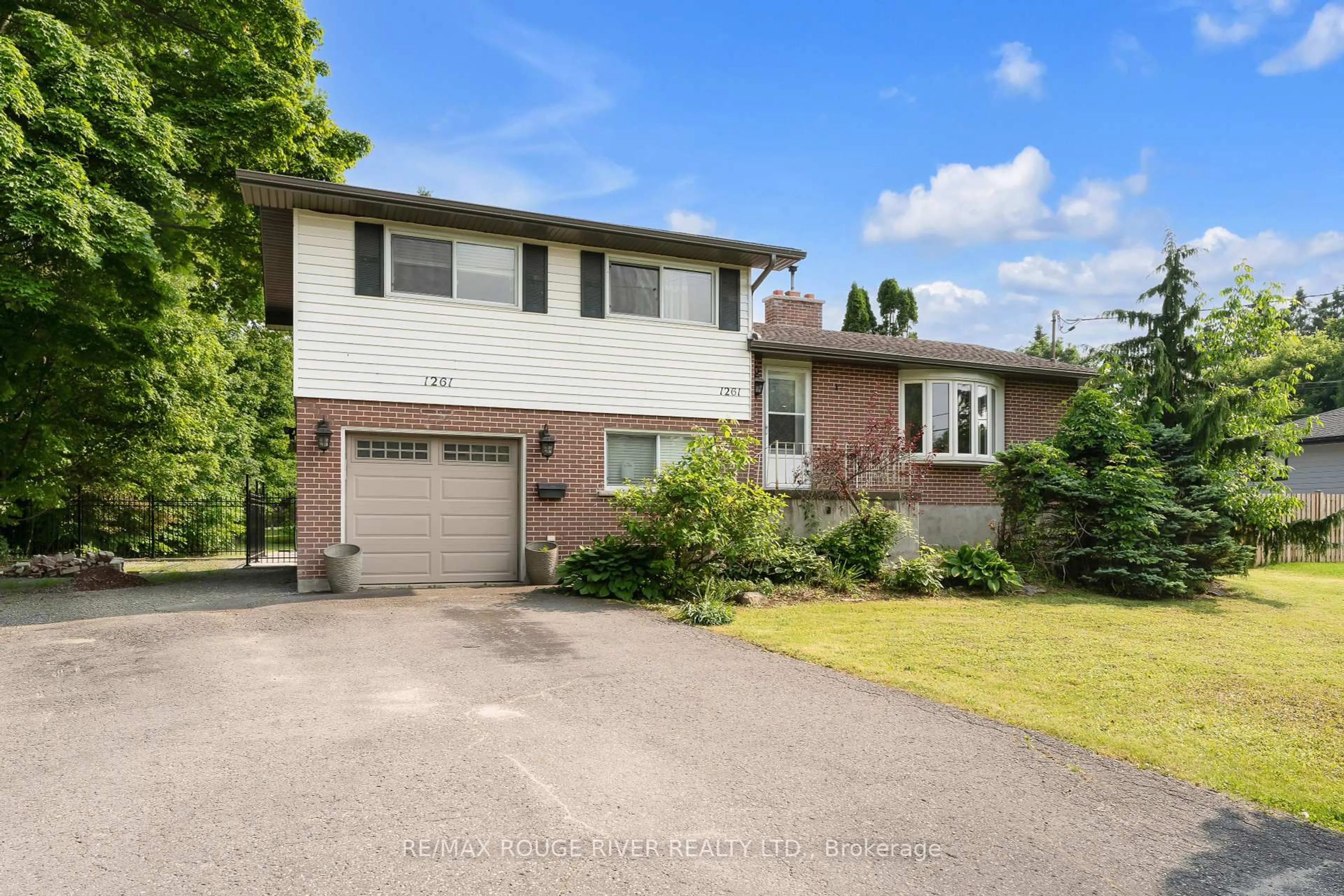 Home with brick exterior material, street for 1261 Prince Charles Dr, Kingston Ontario K7M 5J9
