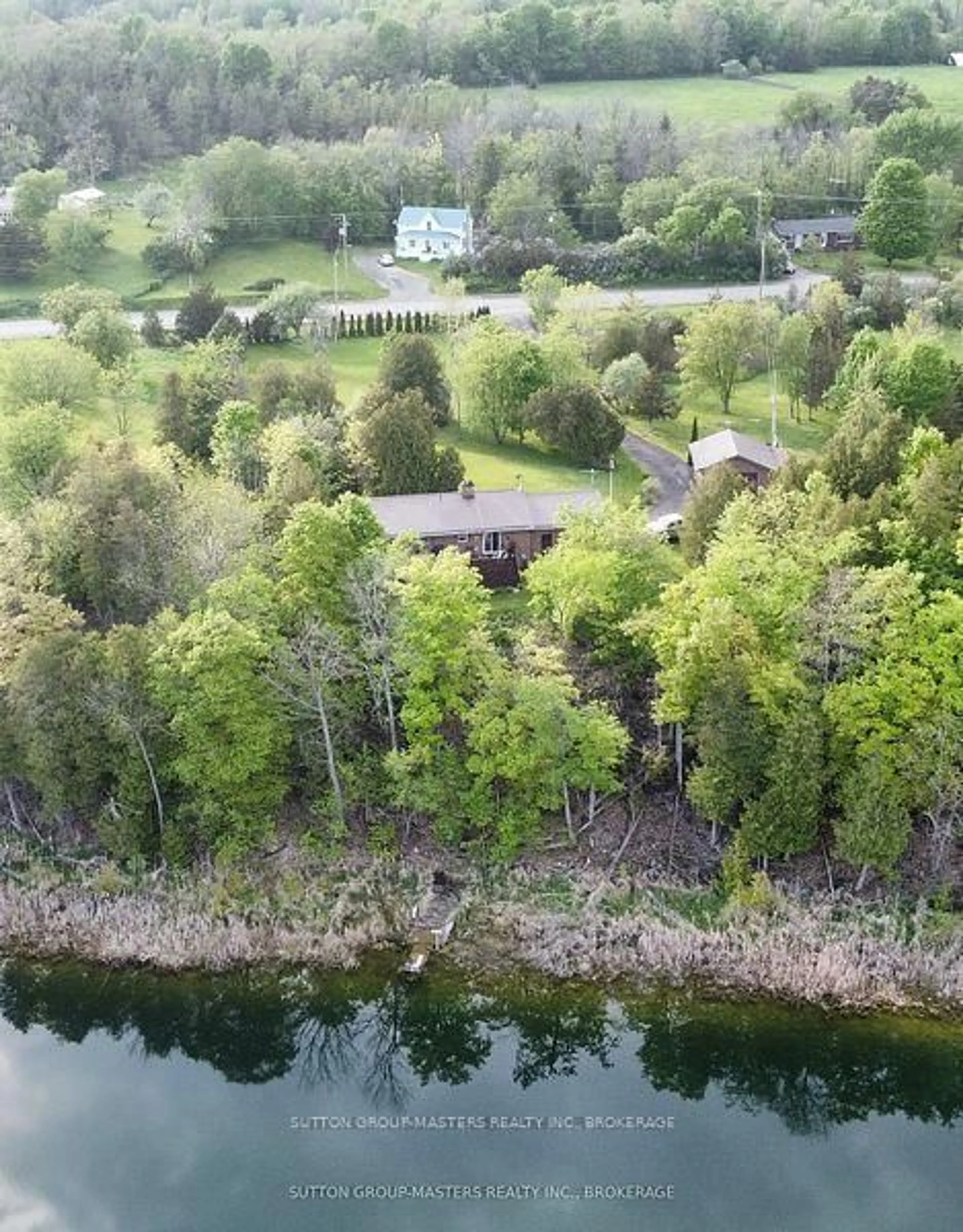 A pic from outside/outdoor area/front of a property/back of a property/a pic from drone, water/lake/river/ocean view for 4822 BATTERSEA Rd, Battersea Ontario K0H 1H0