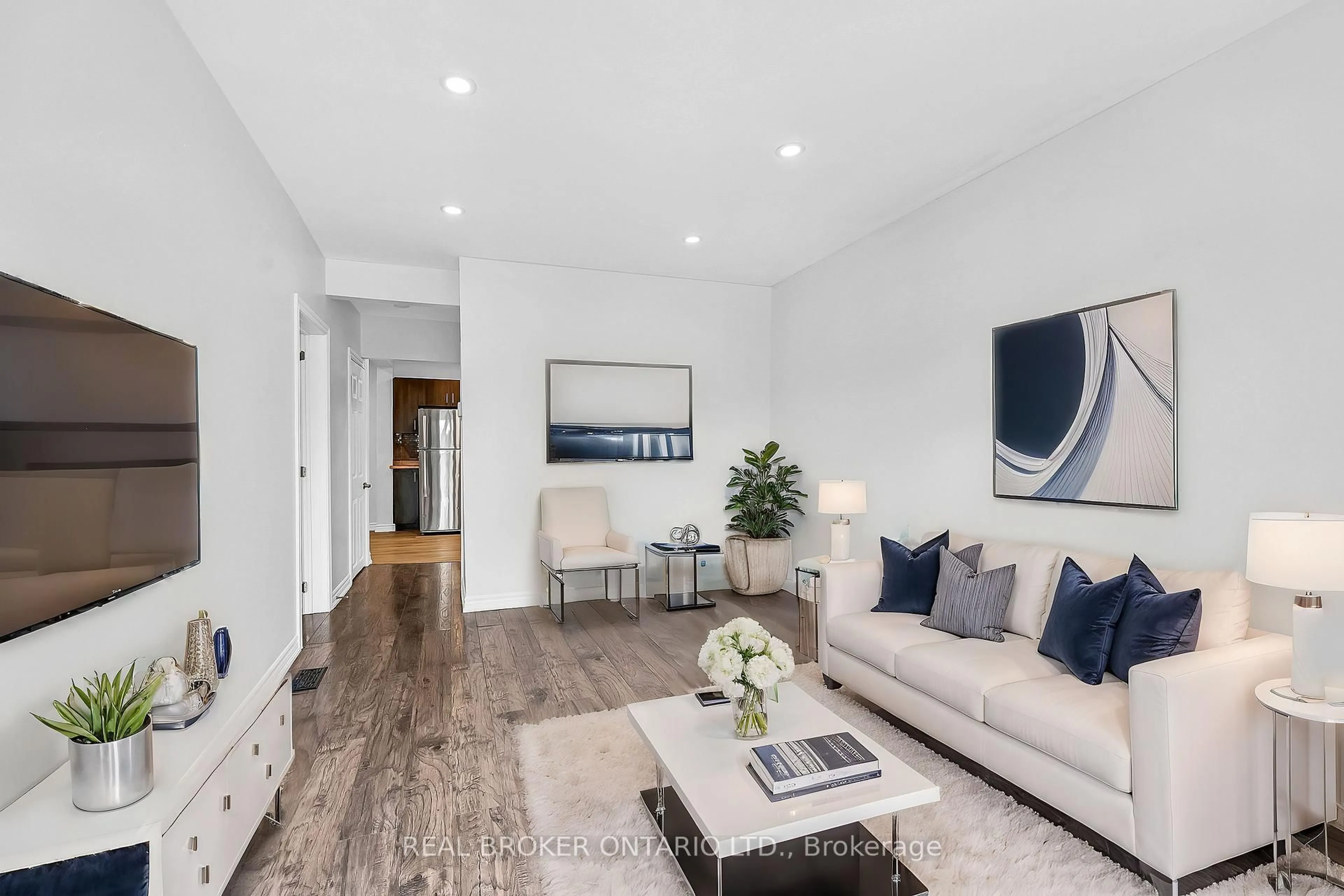 Living room with furniture, wood/laminate floor for 417 Paling Ave, Hamilton Ontario L8H 5K3