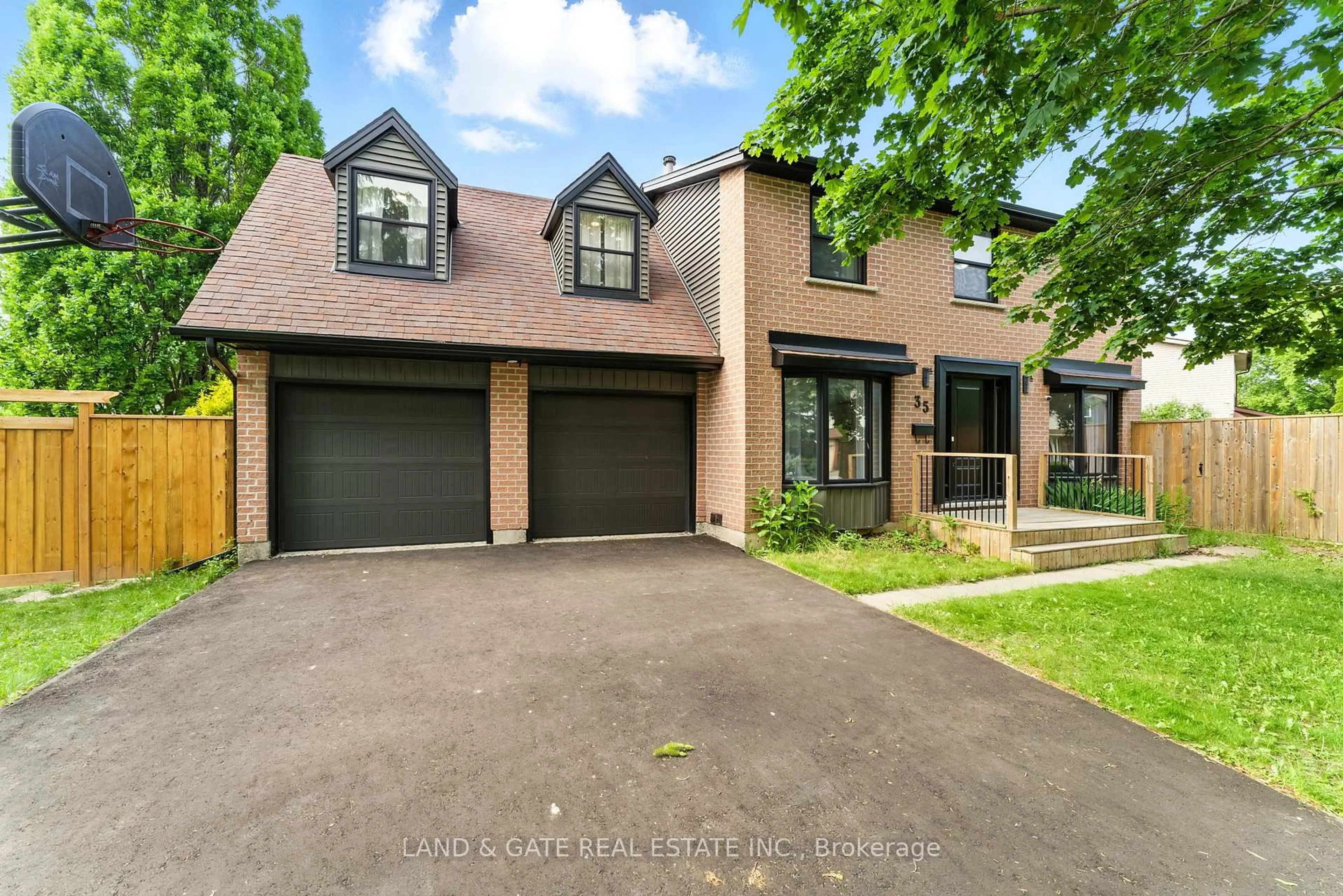 Home with brick exterior material, street for 35 Aspen Valley Cres, Guelph Ontario N1G 3Z9
