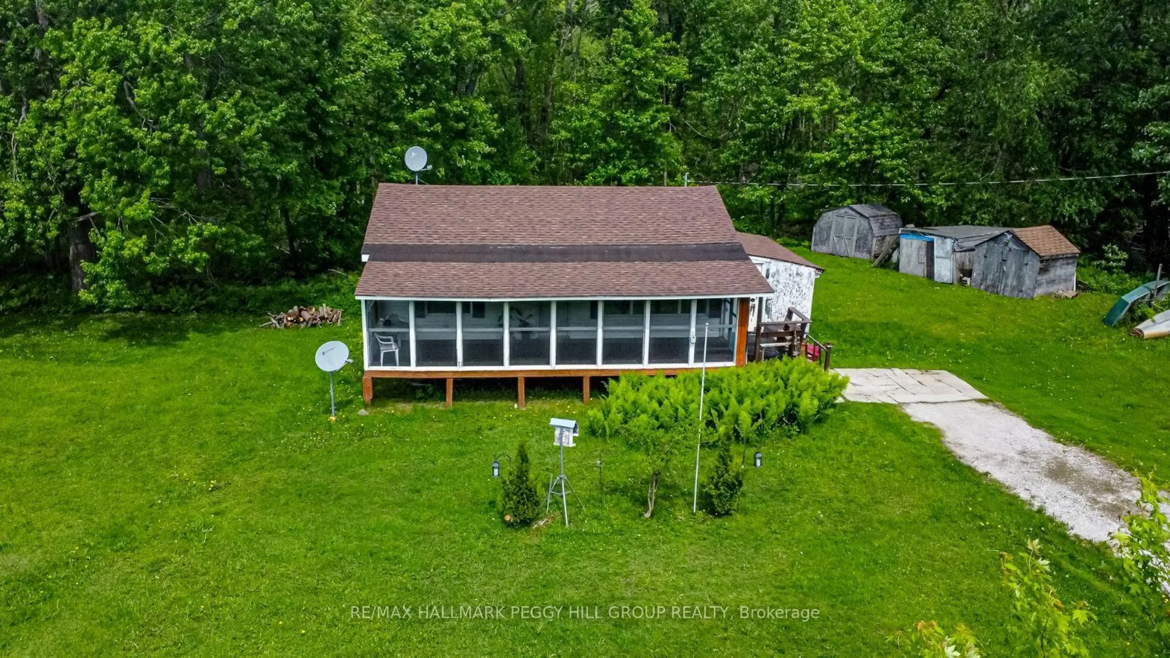 A pic from outside/outdoor area/front of a property/back of a property/a pic from drone, water/lake/river/ocean view for 311 Black River Rd, Kawartha Lakes Ontario L0K 2B0
