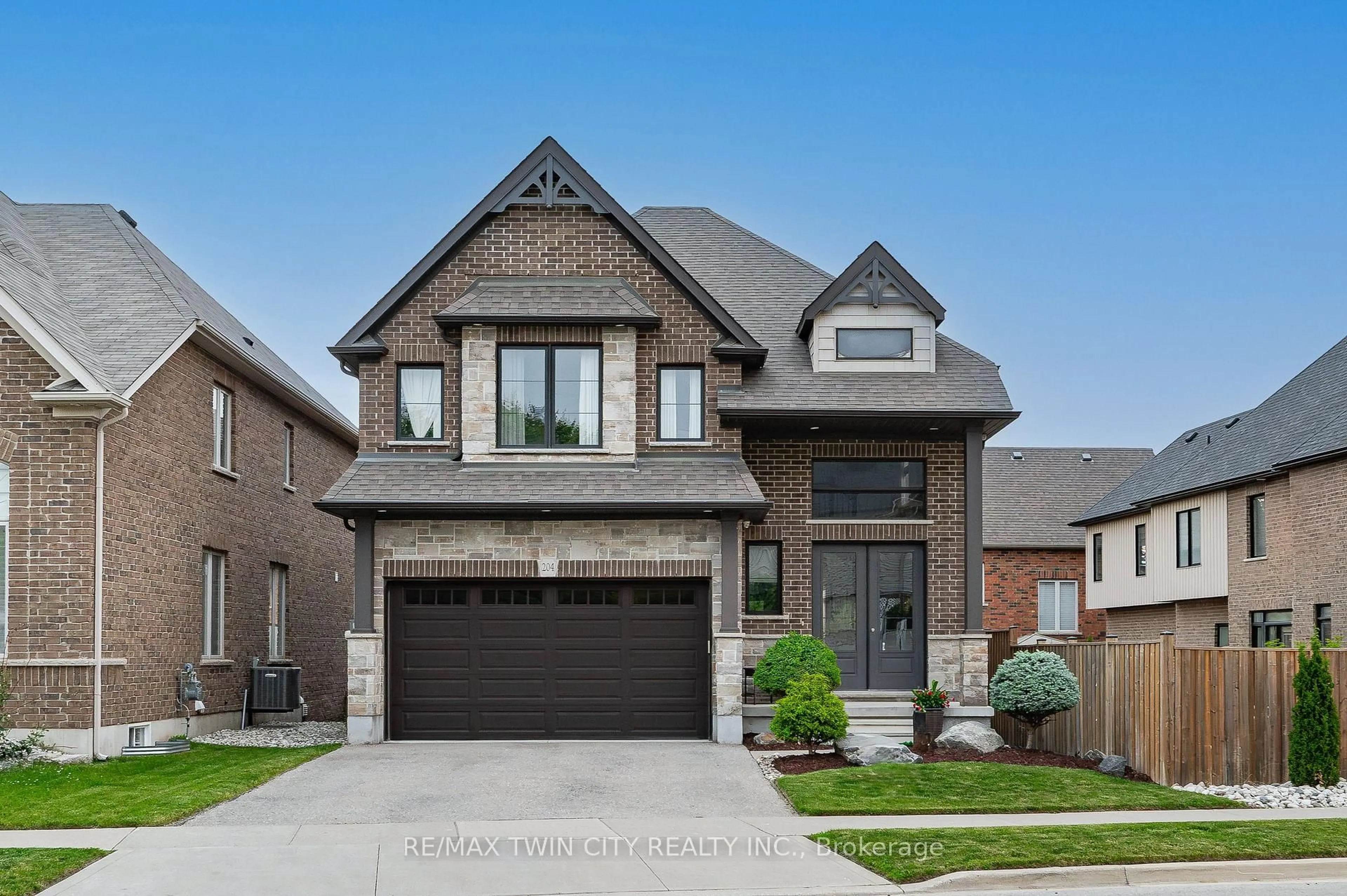 Home with brick exterior material, street for 204 Evens Pond Cres, Kitchener Ontario N2R 0B7