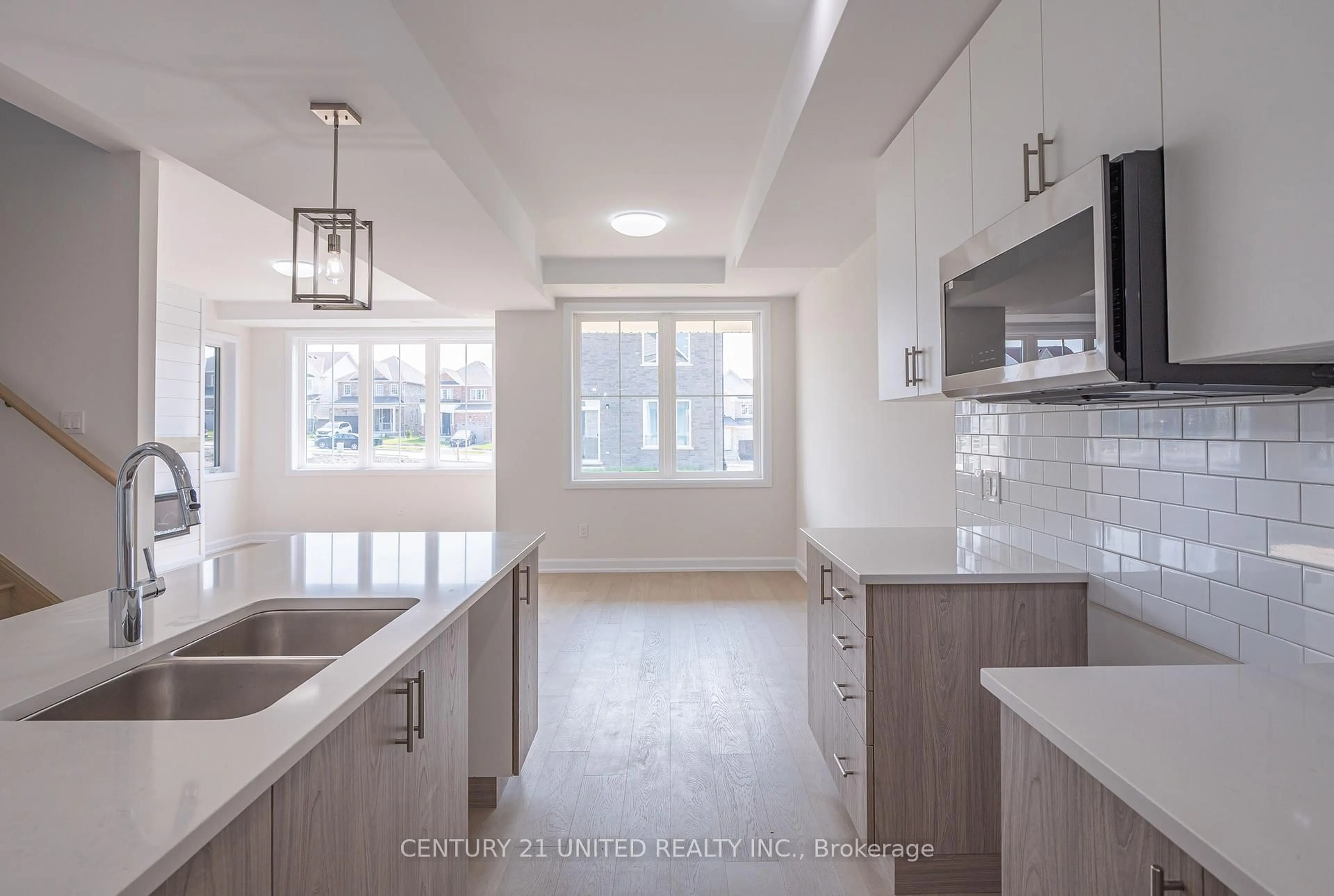Open concept kitchen, ceramic/tile floor for 307 Mullighan Gdns, Peterborough North Ontario K9K 0H2