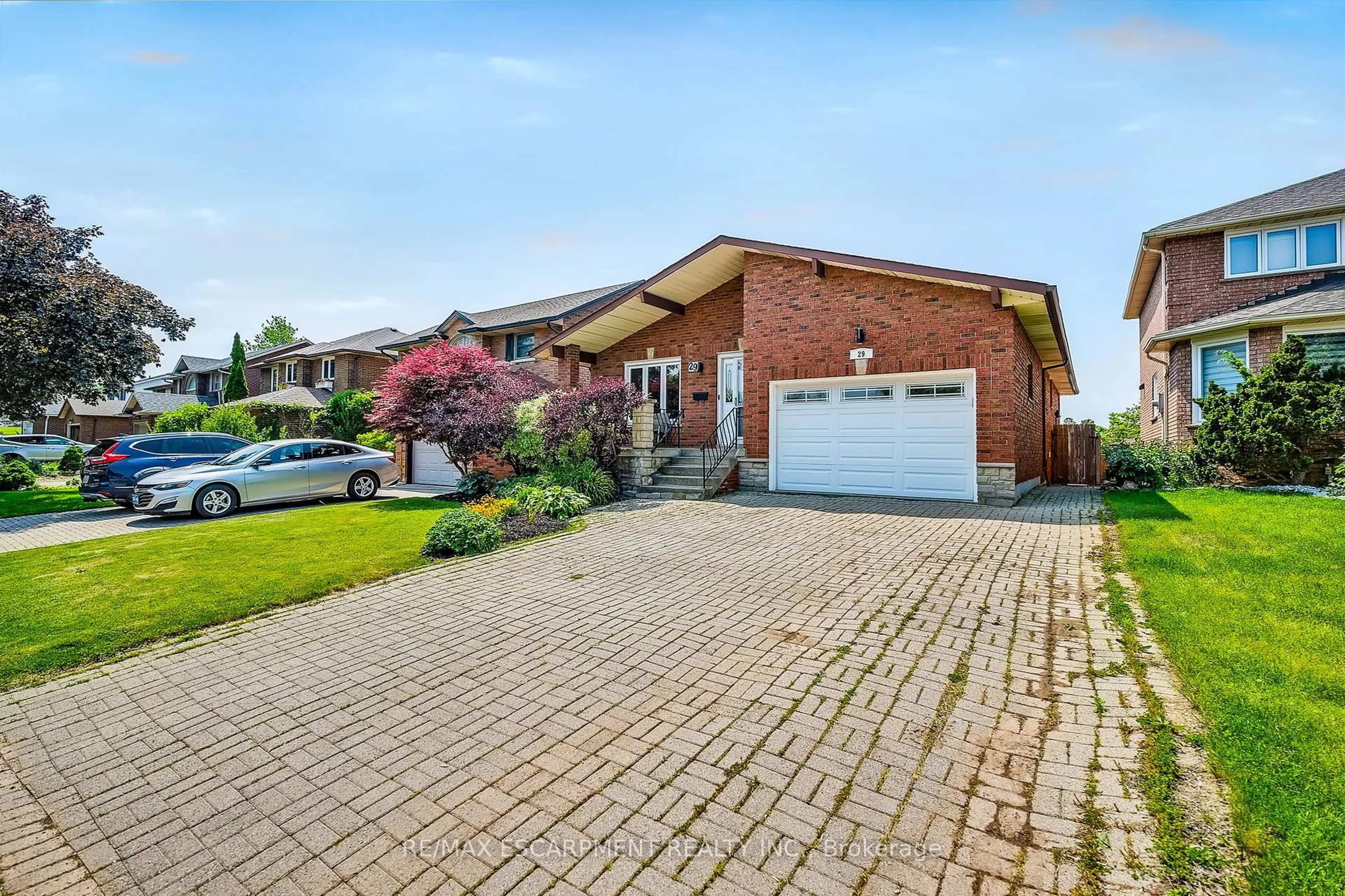 Home with brick exterior material, street for 29 Guildwood Dr, Hamilton Ontario L9C 7K2