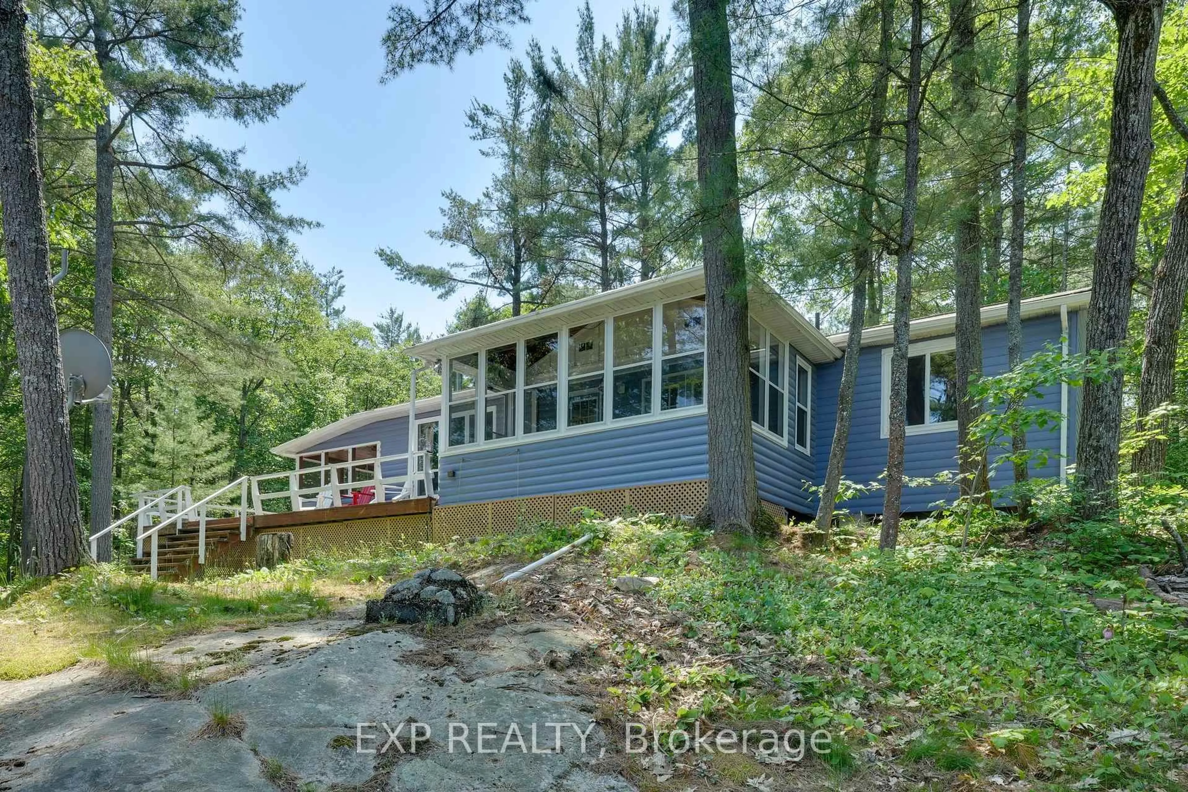 A pic from outside/outdoor area/front of a property/back of a property/a pic from drone, water/lake/river/ocean view for 7156 Severn River Shore, Georgian Bay Ontario P0C 1M0