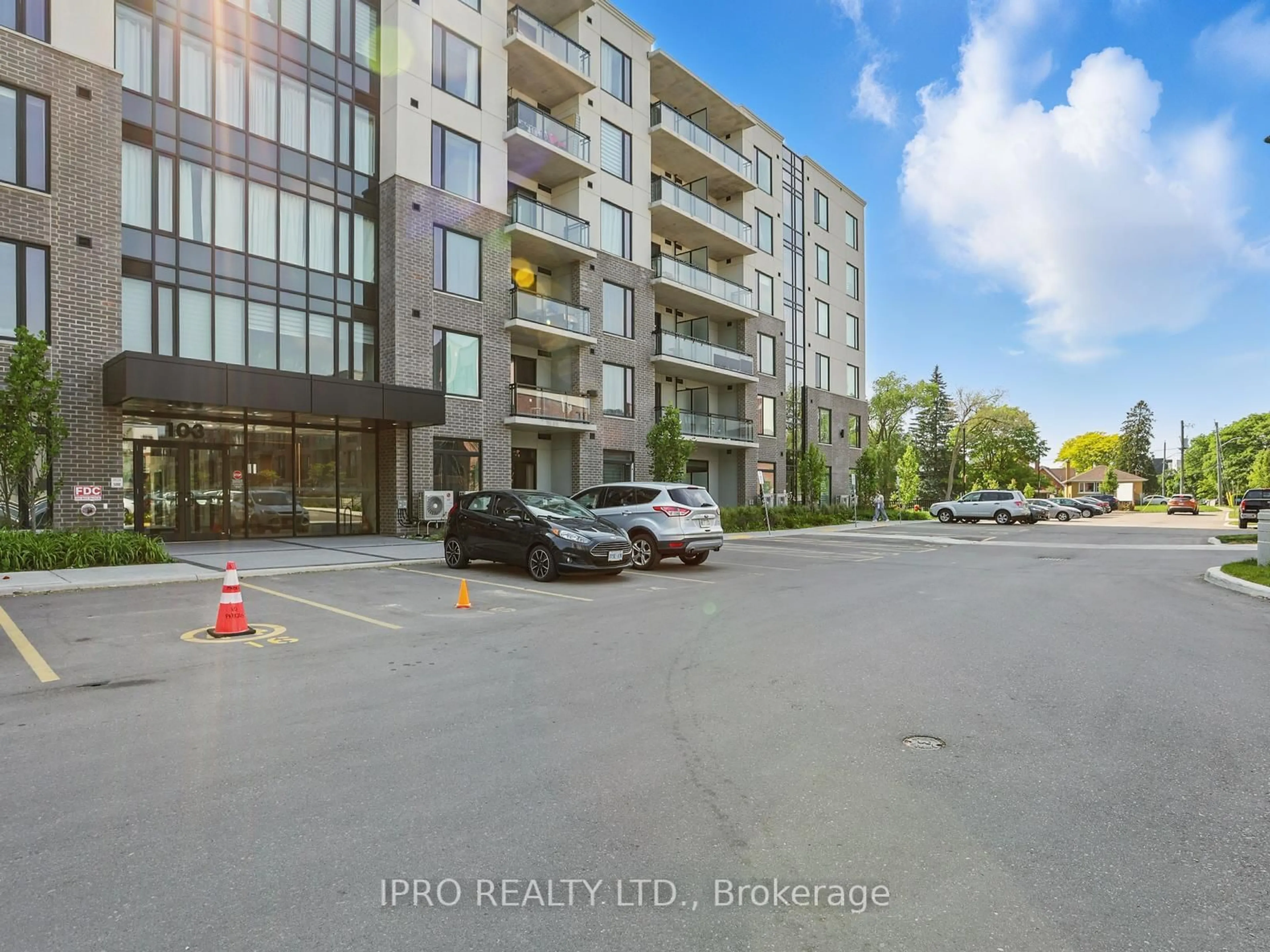 A pic from outside/outdoor area/front of a property/back of a property/a pic from drone, unknown for 103 Roger St #411, Waterloo Ontario N2J 0G2