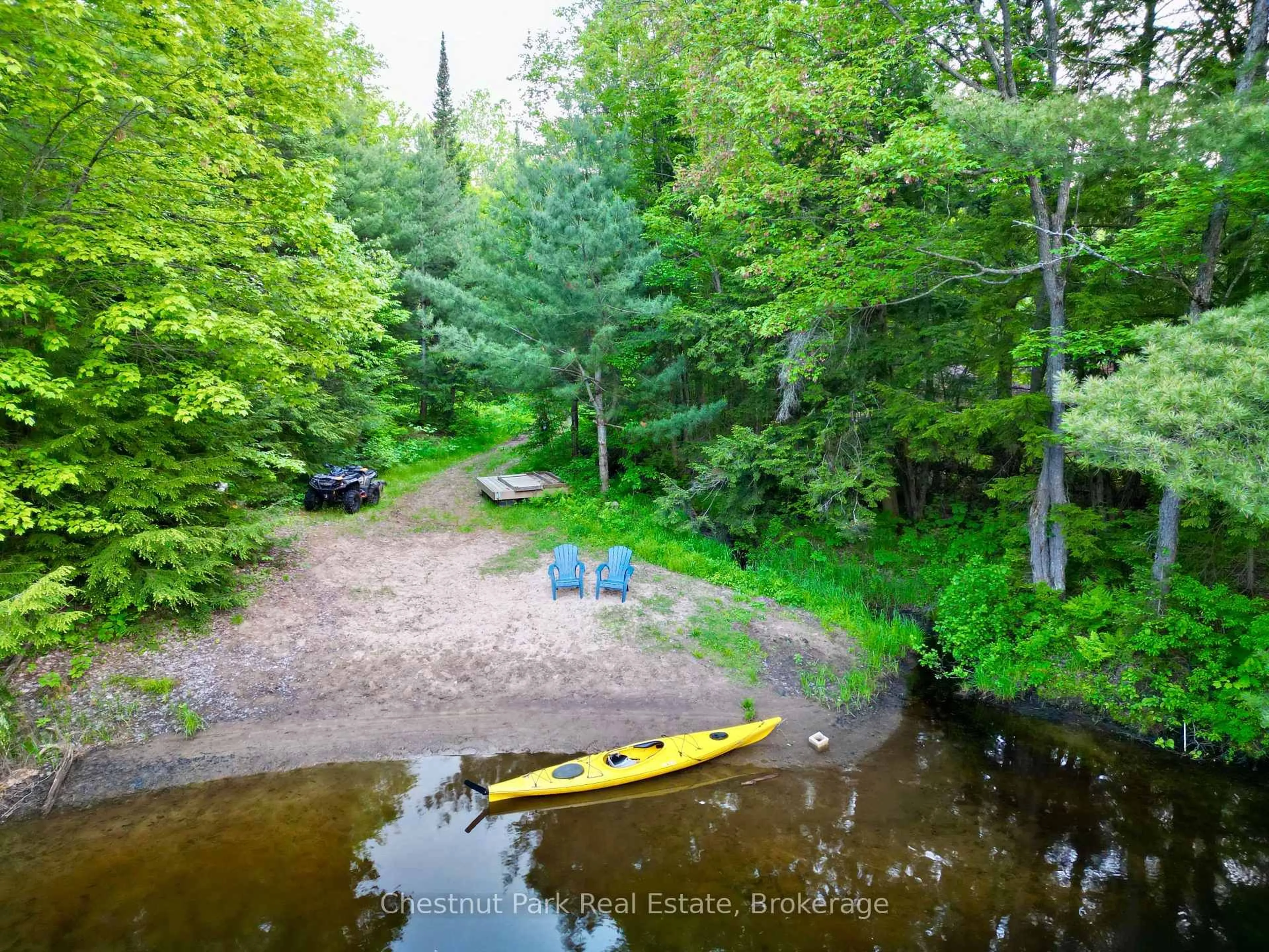 A pic from outside/outdoor area/front of a property/back of a property/a pic from drone, water/lake/river/ocean view for 1053 Holiday Park Dr, Bracebridge Ontario P1L 1W9