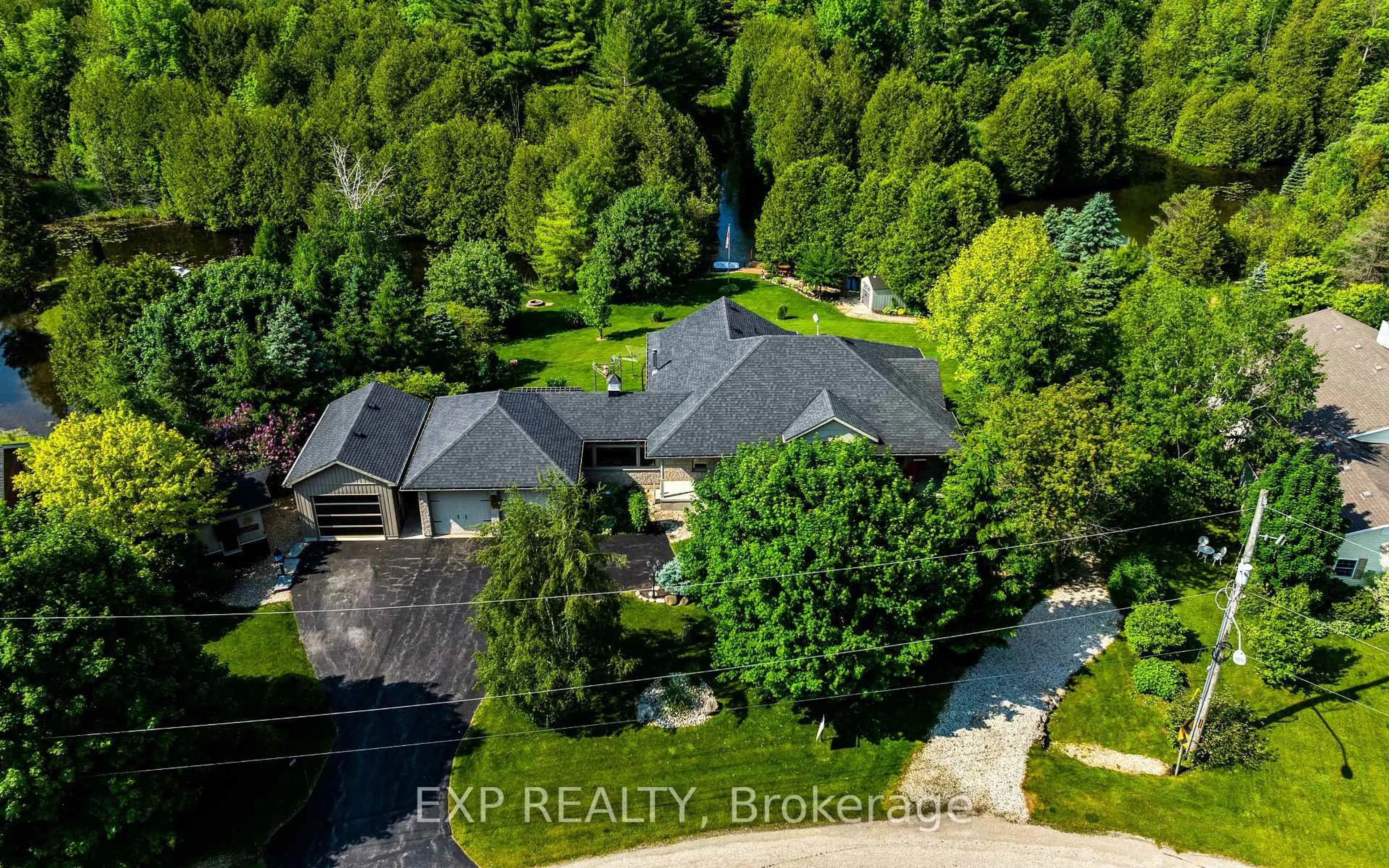A pic from outside/outdoor area/front of a property/back of a property/a pic from drone, unknown for 10 James St, Minto Ontario N0G 2L0
