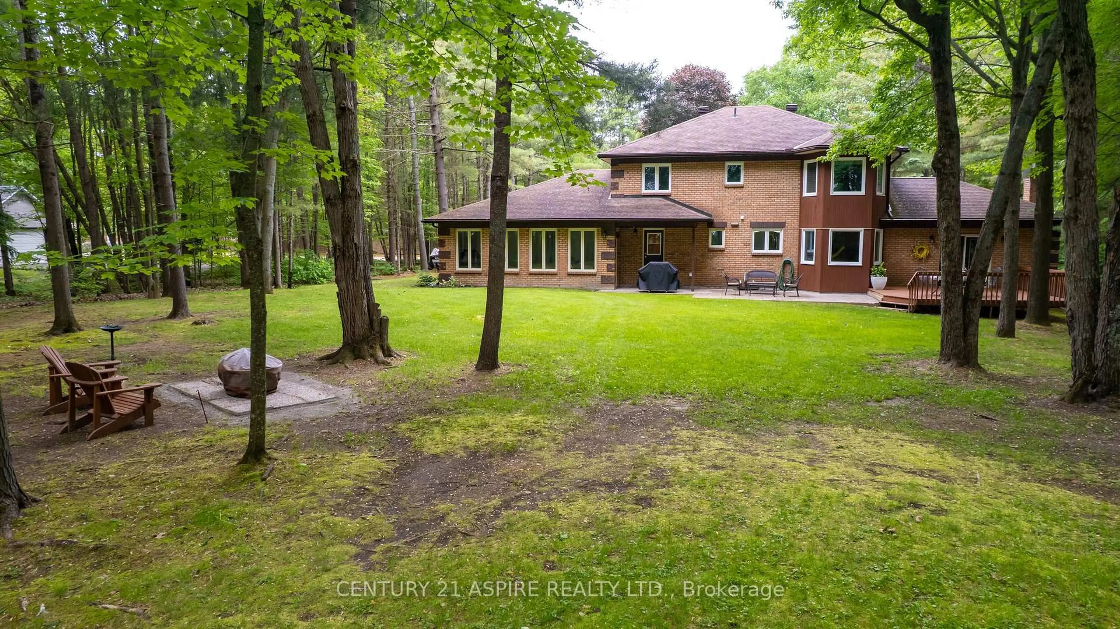 A pic from outside/outdoor area/front of a property/back of a property/a pic from drone, forest/trees view for 13 Country Lane, Petawawa Ontario K8H 3E2