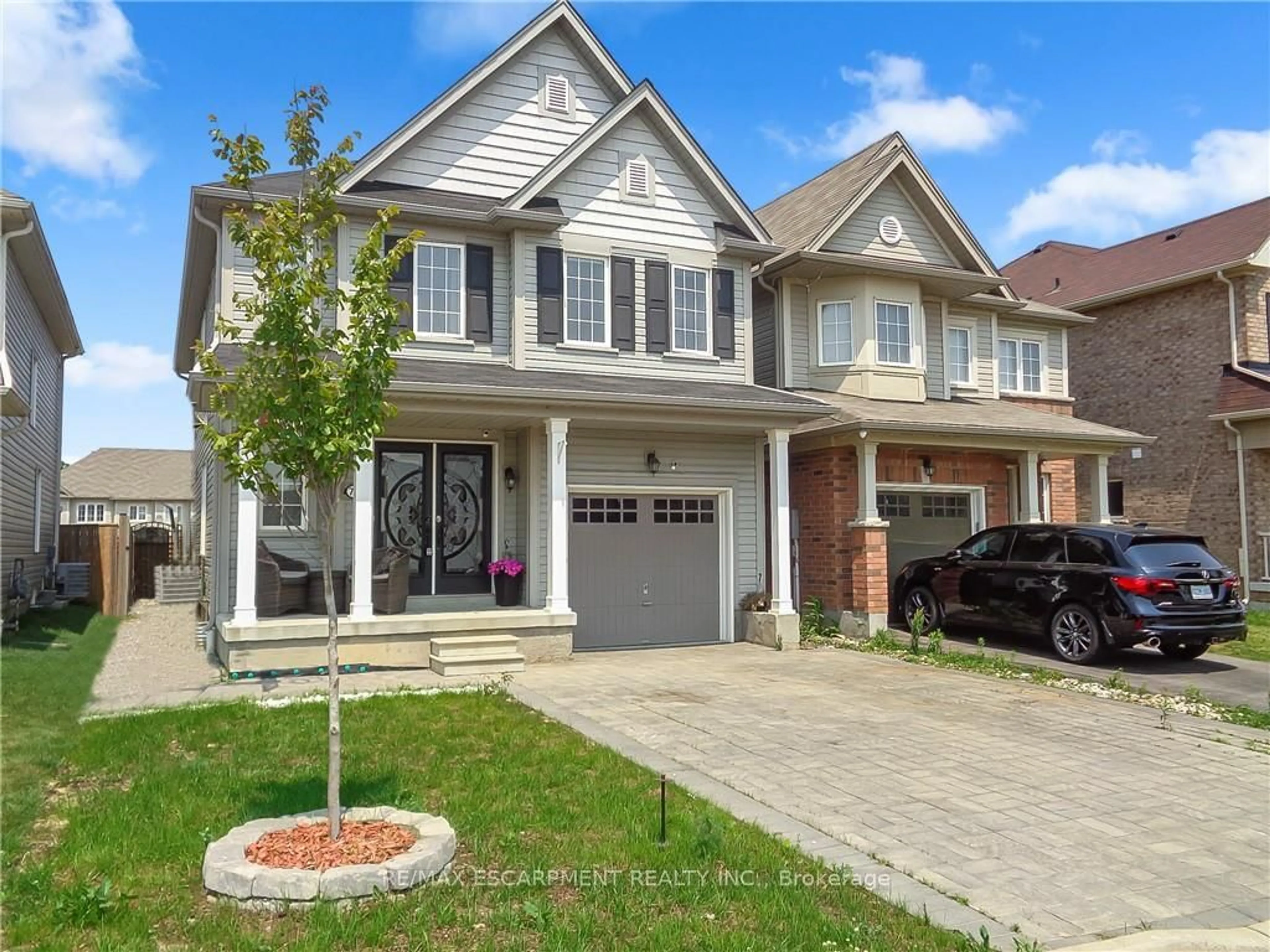 Home with brick exterior material, street for 76 McAllistar Dr, Hamilton Ontario L0R 1C0