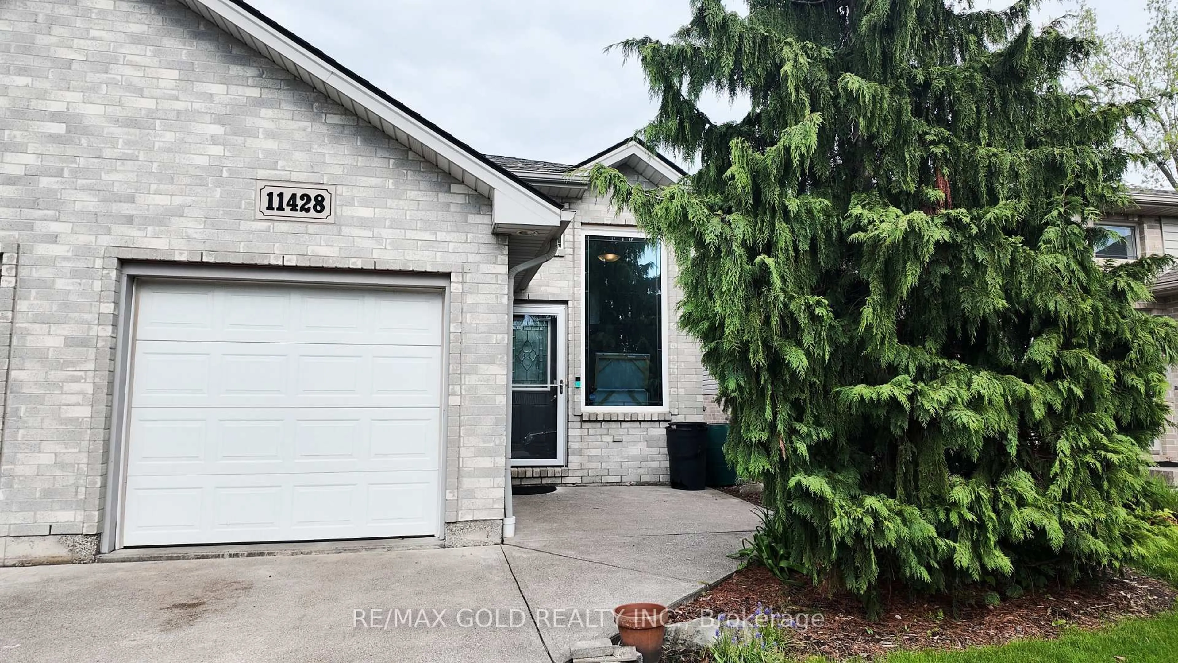 Home with brick exterior material, street for 11428 Timber Bay Cres, Windsor Ontario N8R 2K9
