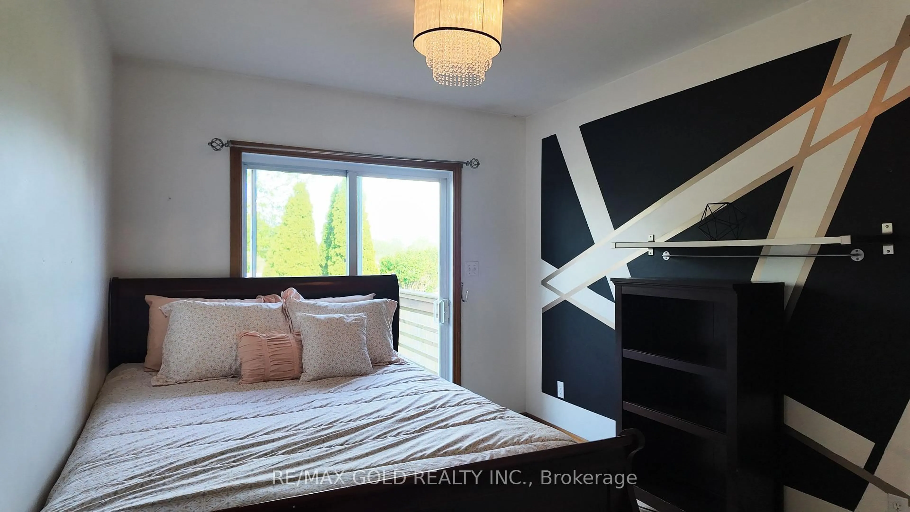 Bedroom with bed, wood/laminate floor for 11428 Timber Bay Cres, Windsor Ontario N8R 2K9