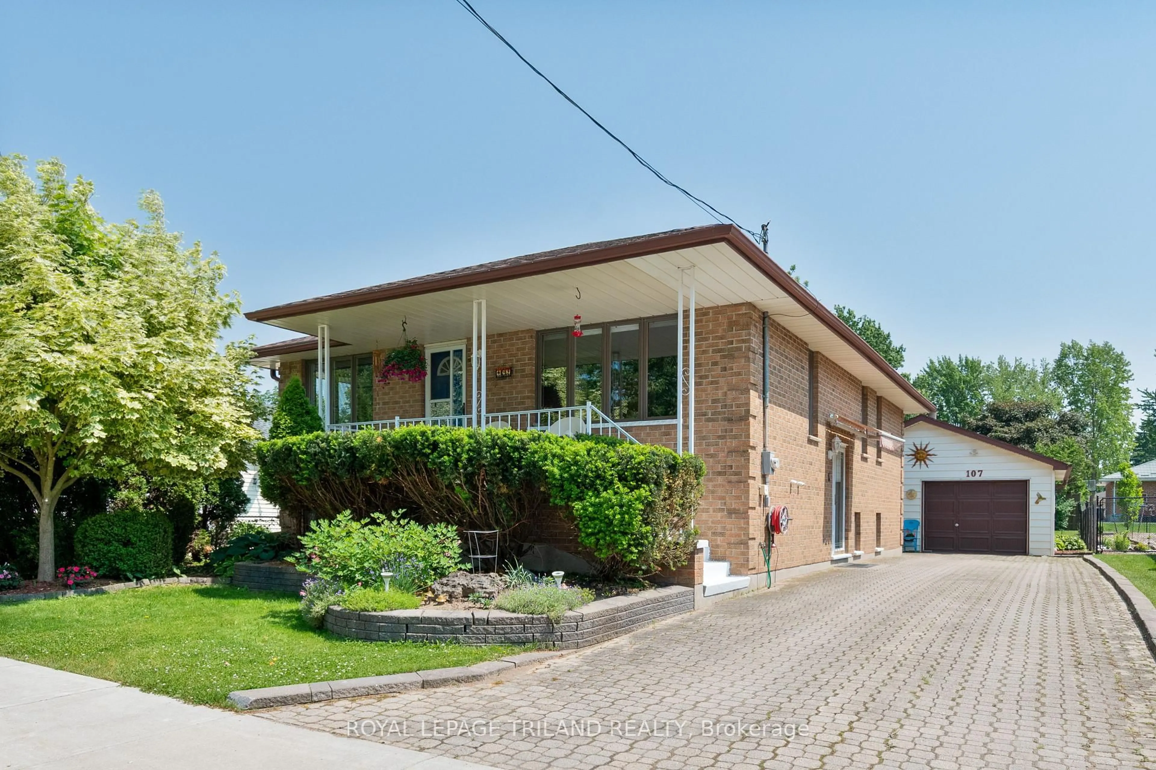 Home with brick exterior material, street for 107 Alice St, Lucan Biddulph Ontario N0M 2J0