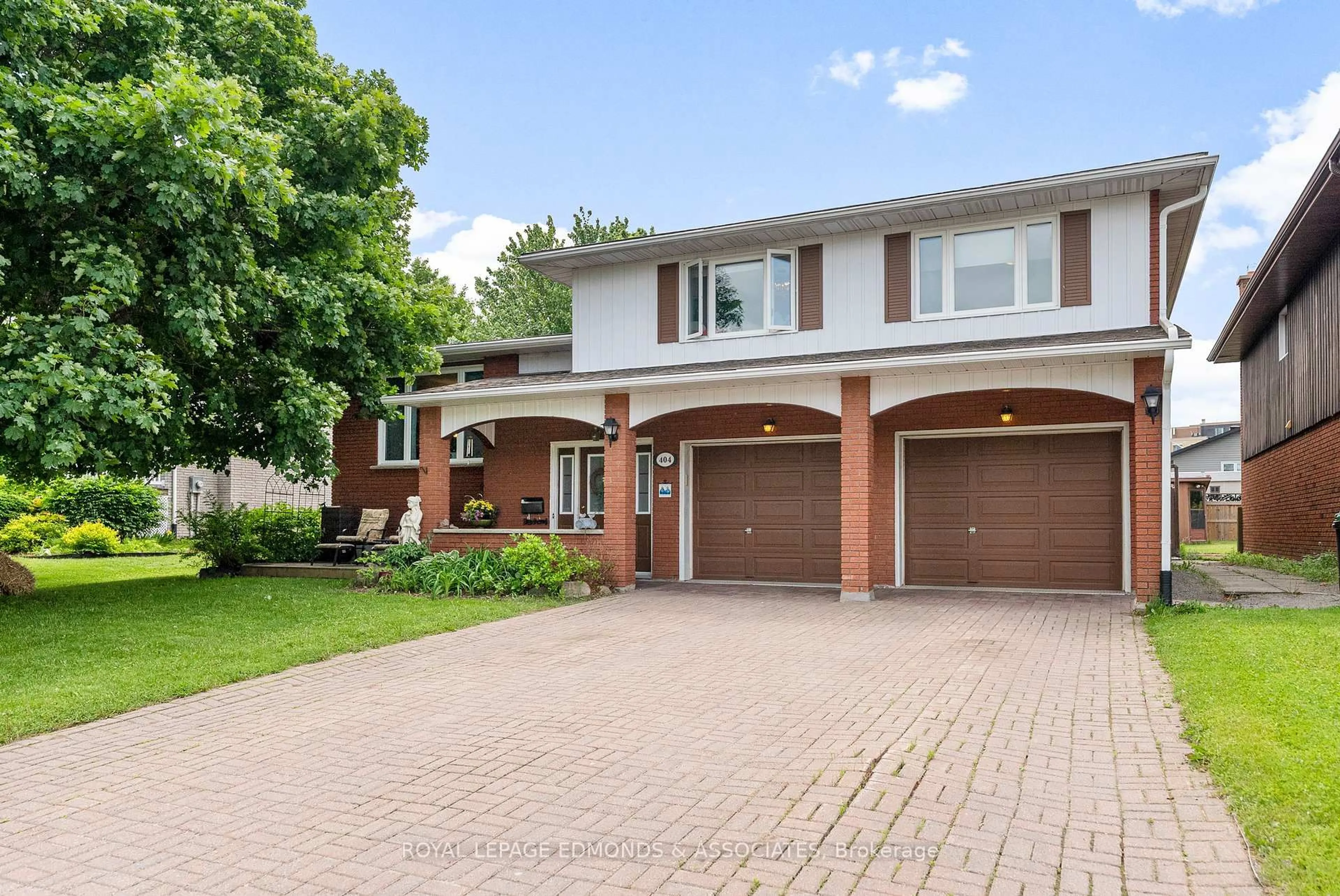 Home with brick exterior material, street for 404 Chamberlain St, Pembroke Ontario K8A 7Y2