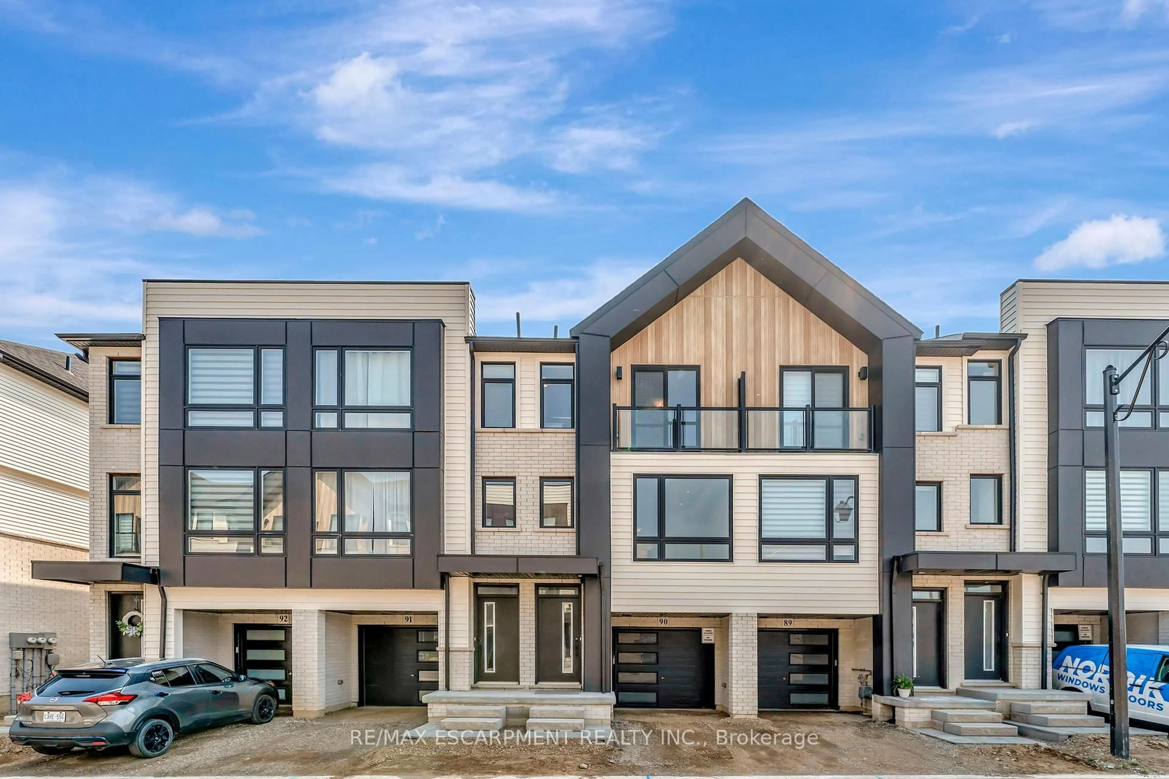 Home with vinyl exterior material, street for 55 TOM BROWN Dr #90, Brant Ontario N3L 0K3
