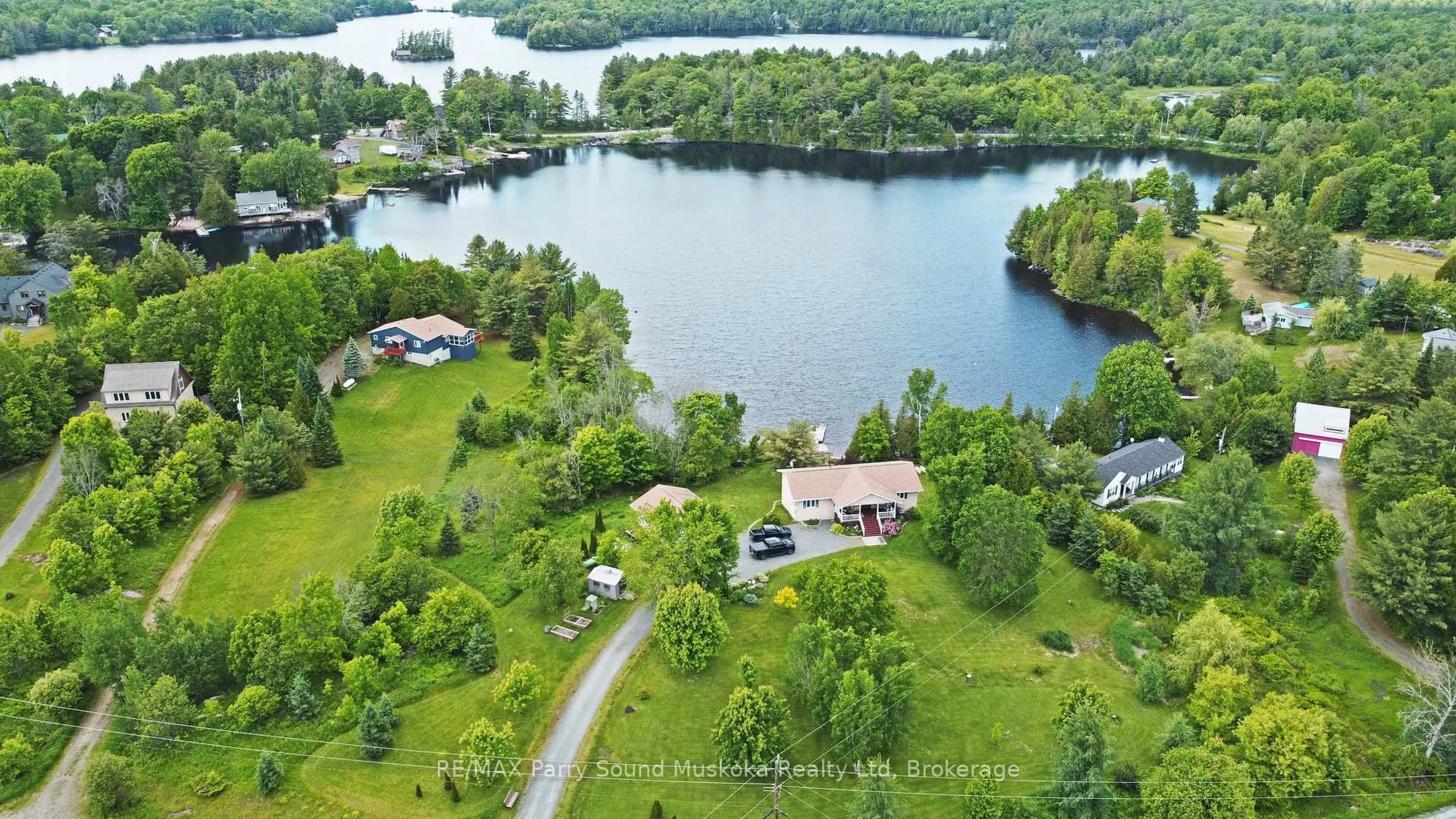 A pic from outside/outdoor area/front of a property/back of a property/a pic from drone, water/lake/river/ocean view for 17 Martha Dr, McKellar Ontario P0G 1C0