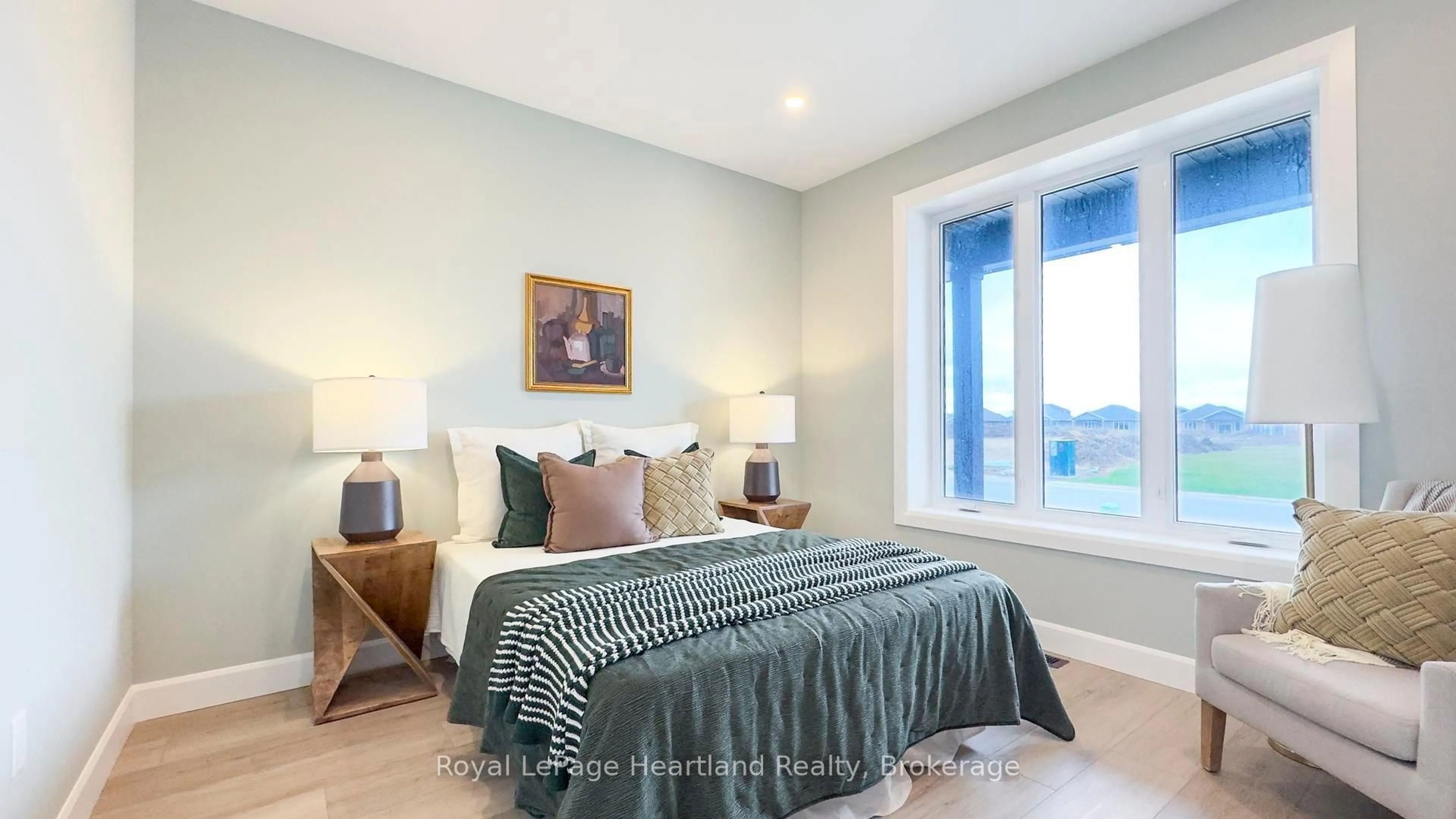 Bedroom with bed, wood/laminate floor for 455 WOODRIDGE Dr, Goderich Ontario N7A 0C7