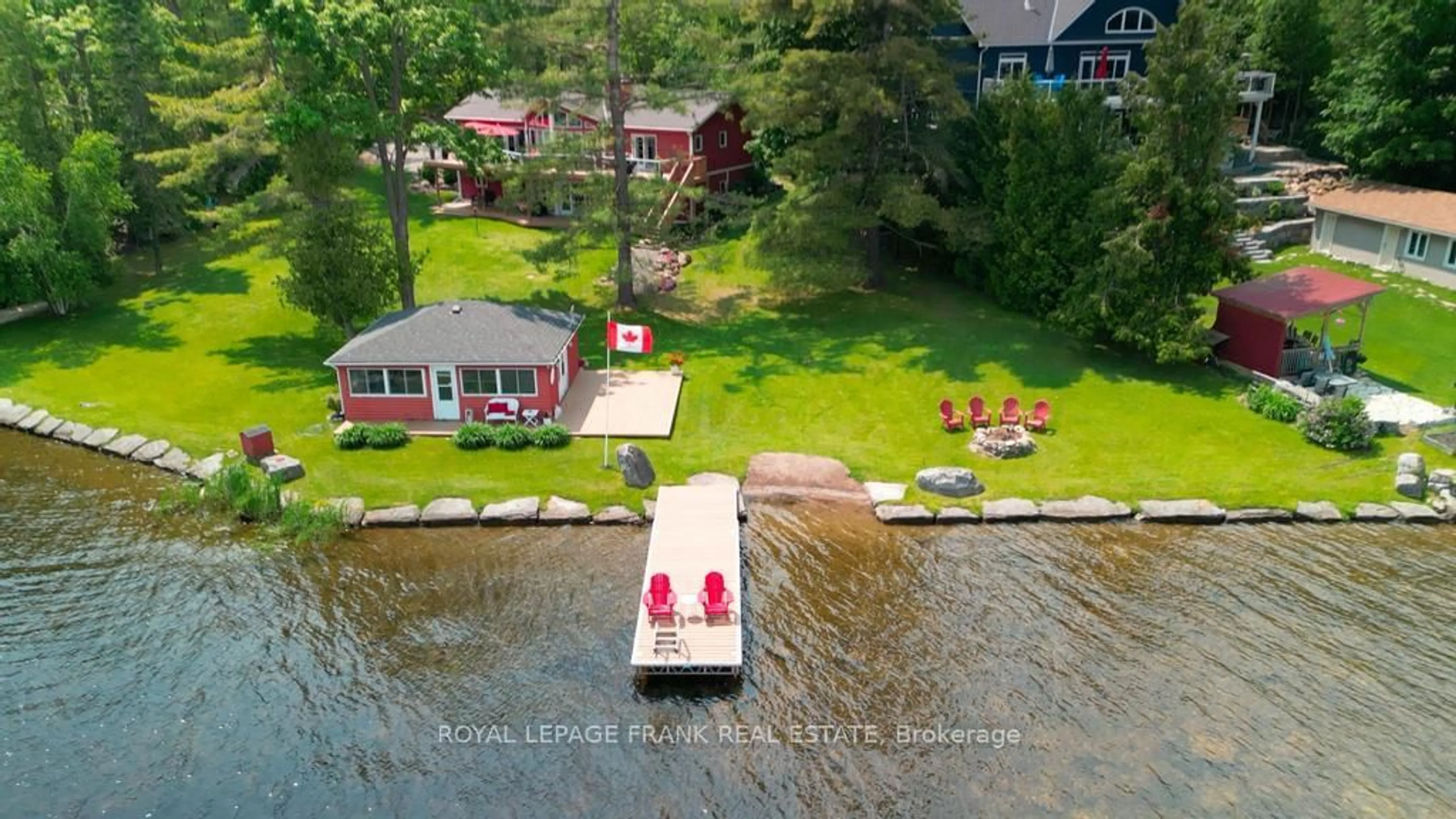 A pic from outside/outdoor area/front of a property/back of a property/a pic from drone, water/lake/river/ocean view for 113 Fire Route 37, Trent Lakes Ontario K0L 1J0