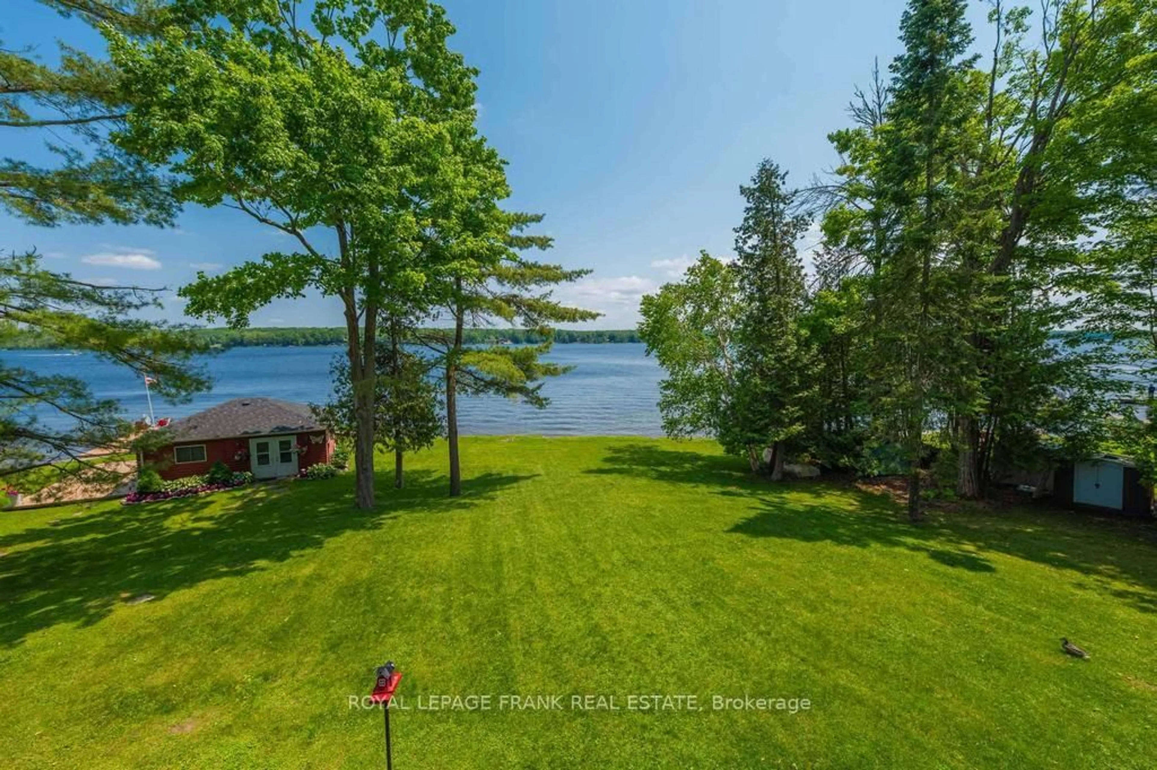 A pic from outside/outdoor area/front of a property/back of a property/a pic from drone, water/lake/river/ocean view for 113 Fire Route 37, Trent Lakes Ontario K0L 1J0