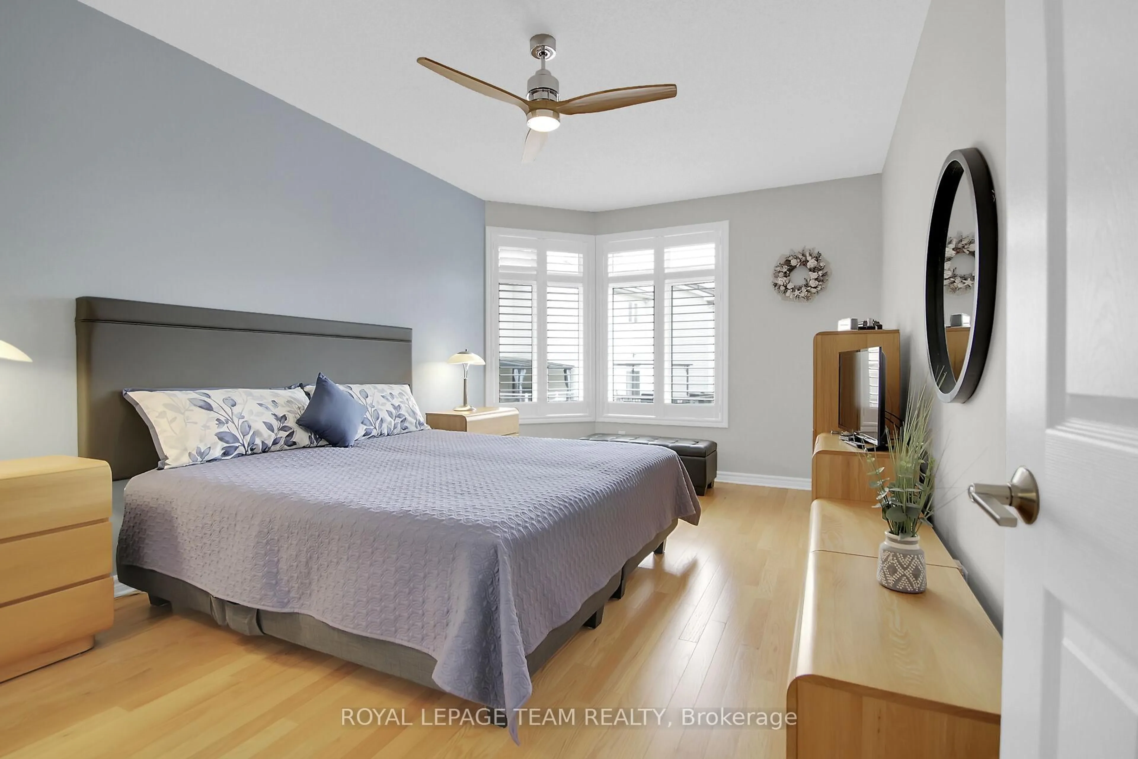 Bedroom with bed, wood/laminate floor for 122 Passageway Private, Ottawa Ontario K2M 2B5