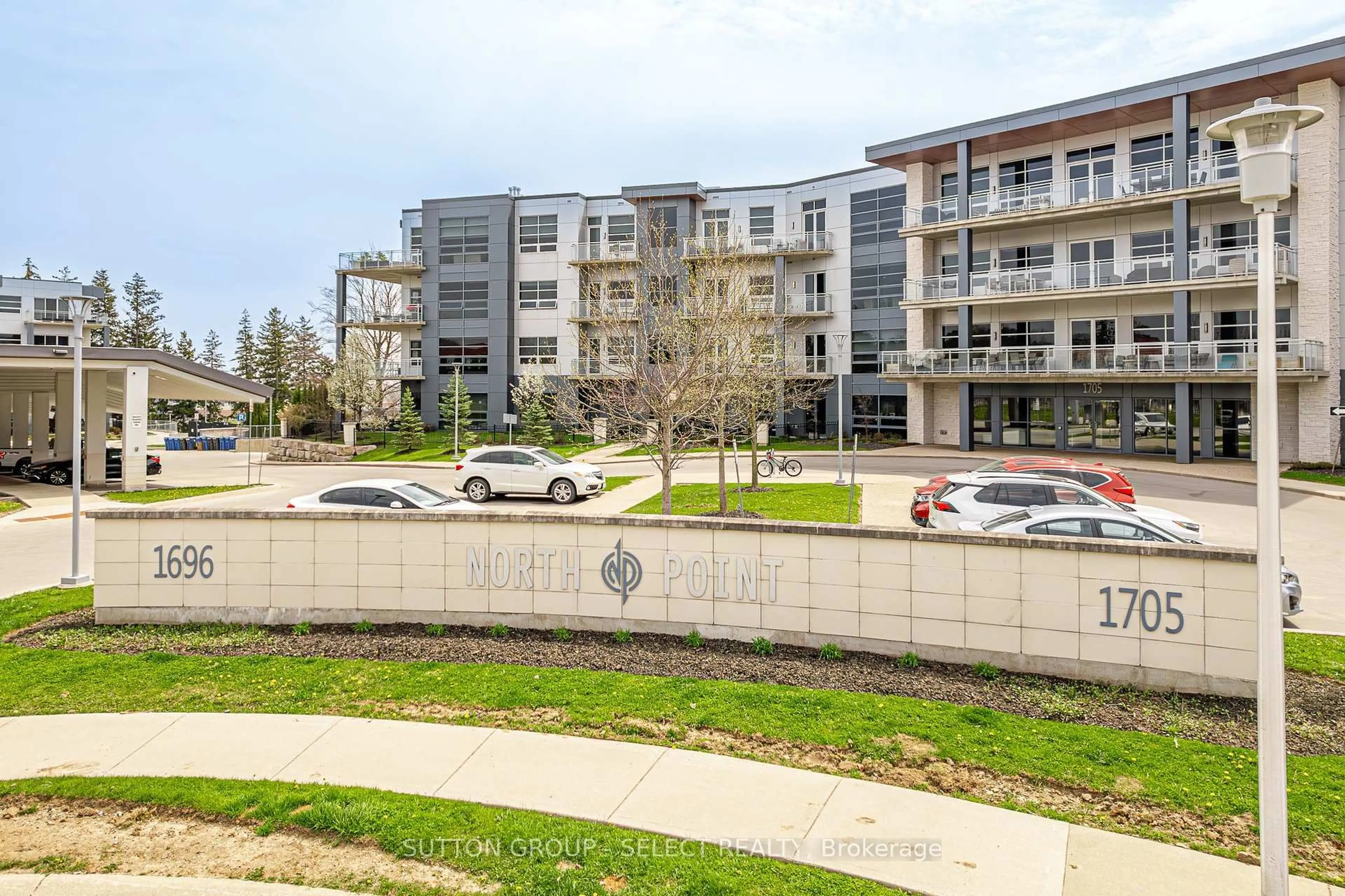 A pic from outside/outdoor area/front of a property/back of a property/a pic from drone, street for 1705 Fiddlehead Pl #307, London North Ontario N6G 0S1