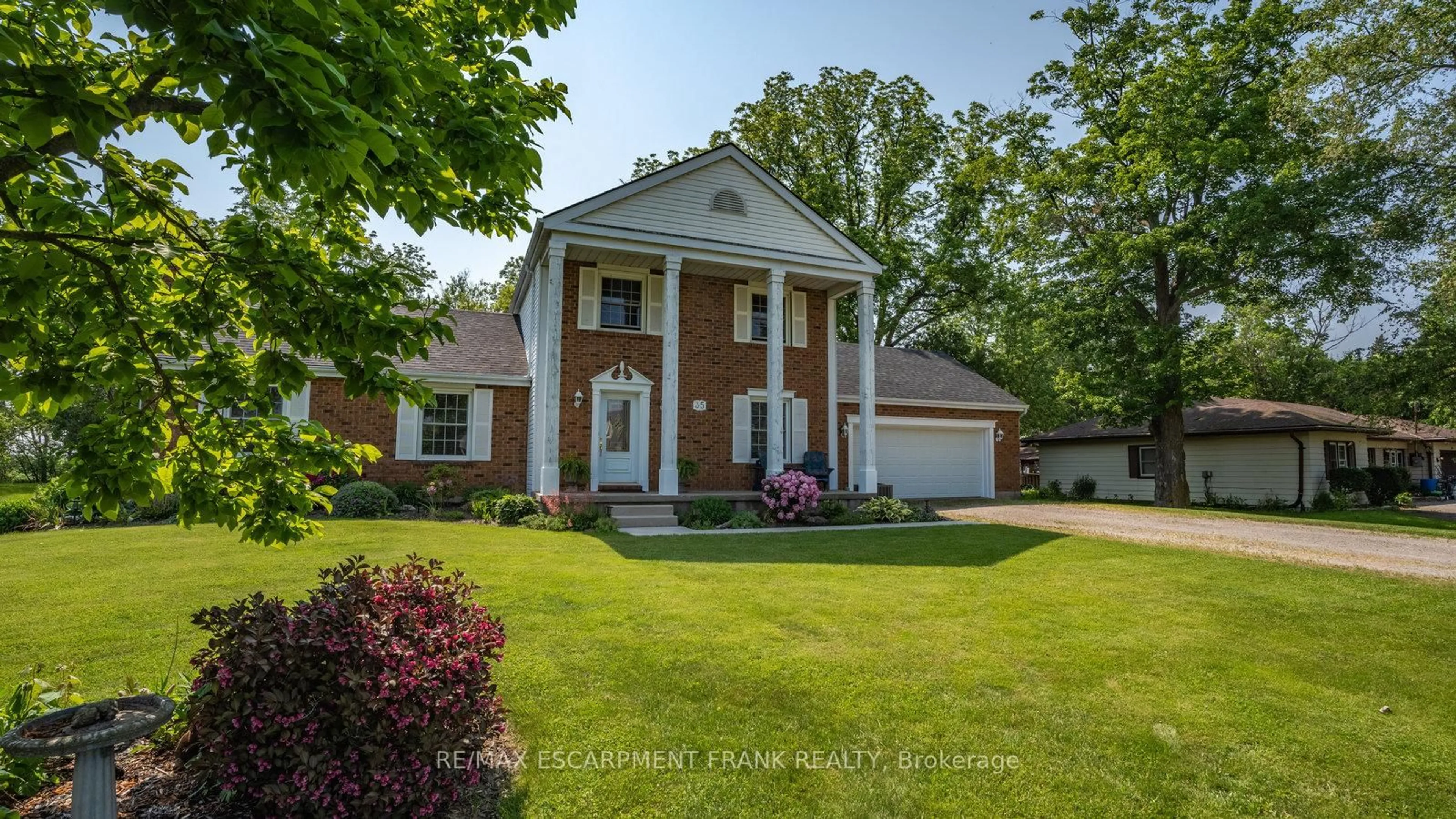 Home with brick exterior material, street for 35 Blossom Ave, Brantford Ontario N3T 5L9