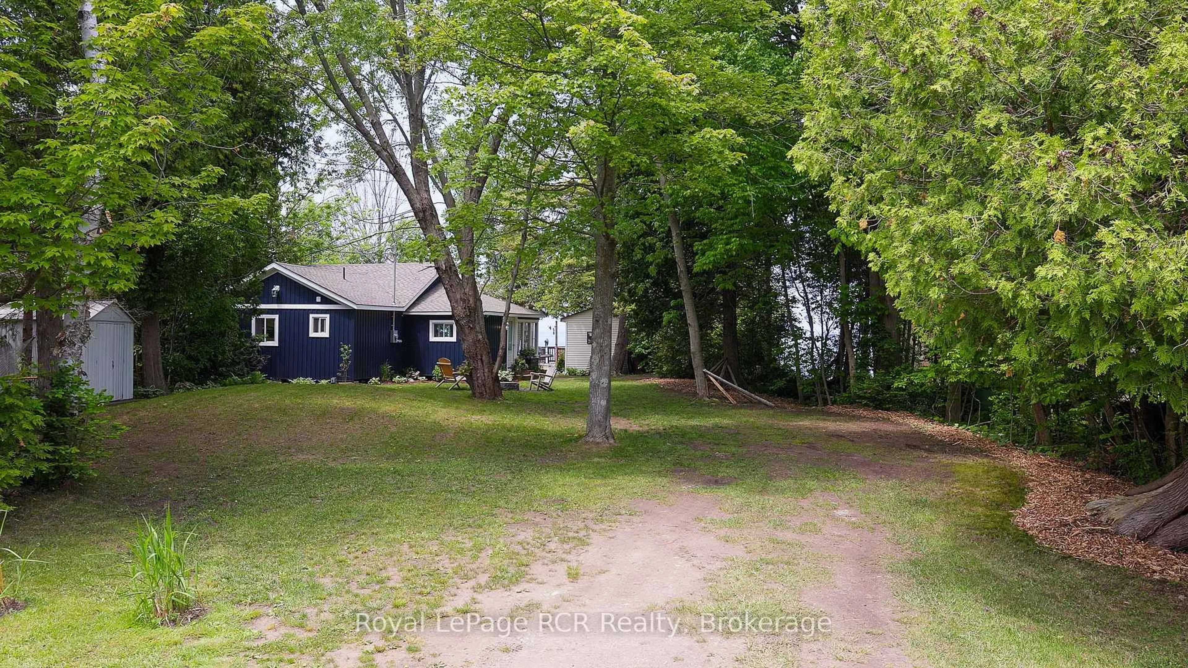 A pic from outside/outdoor area/front of a property/back of a property/a pic from drone, street for 809 Bruce Road 13 Rd, Native Leased Lands Ontario N0H 2L0