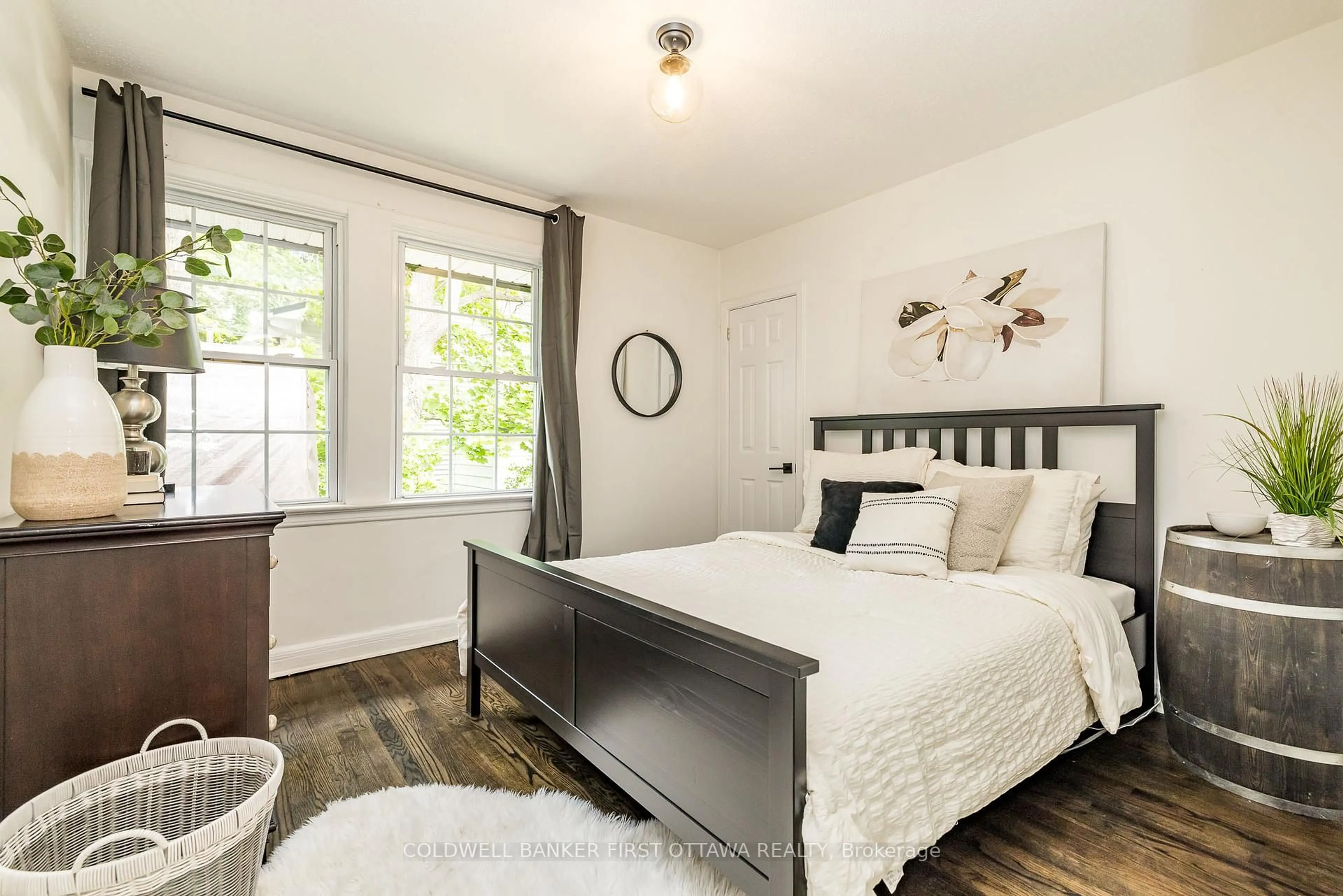 Bedroom with bed, wood/laminate floor for 1 Porter St, Ottawa Ontario K2S 1P8