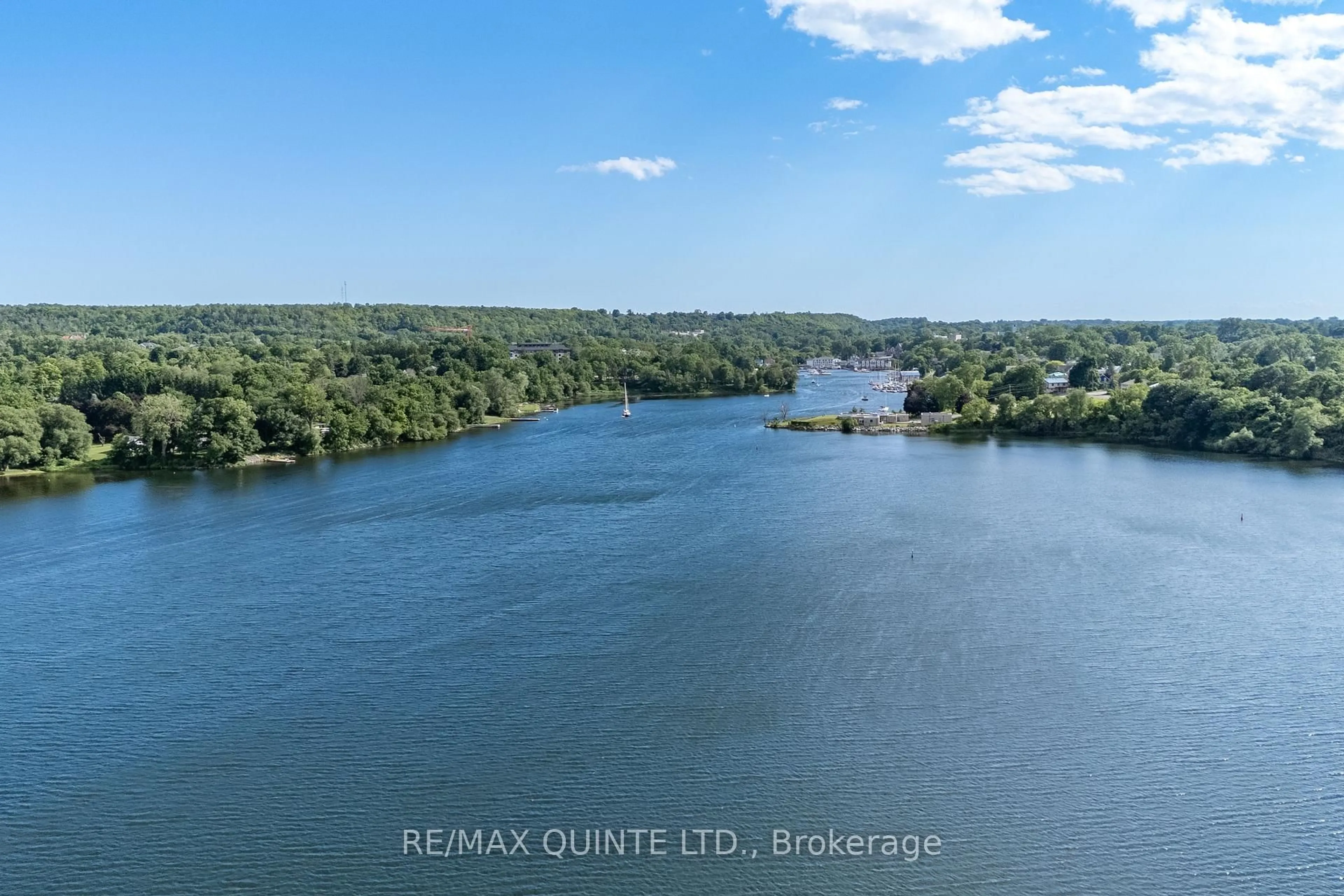 A pic from outside/outdoor area/front of a property/back of a property/a pic from drone, water/lake/river/ocean view for 12 CLARA Dr #302, Prince Edward County Ontario K0K 2T0