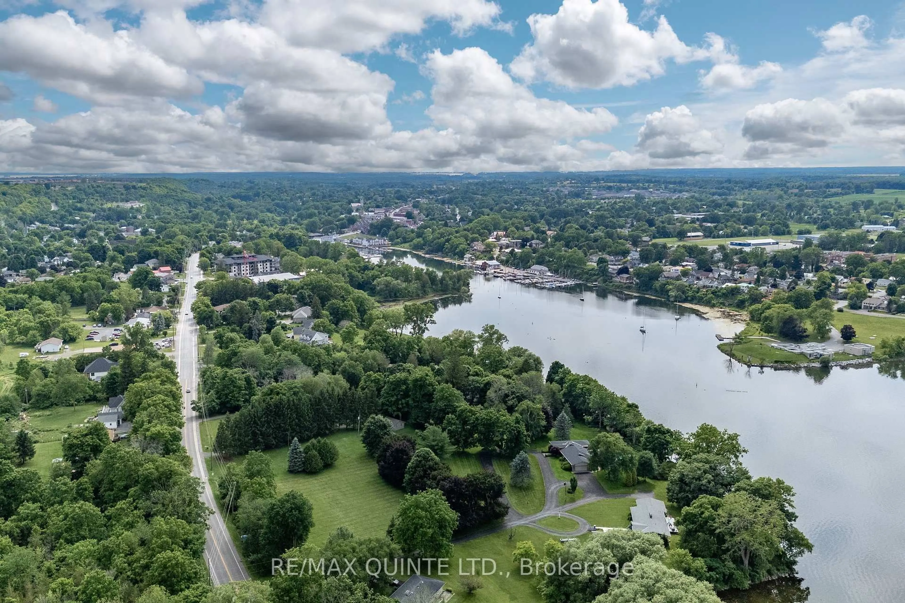 A pic from outside/outdoor area/front of a property/back of a property/a pic from drone, water/lake/river/ocean view for 12 CLARA Dr #302, Prince Edward County Ontario K0K 2T0