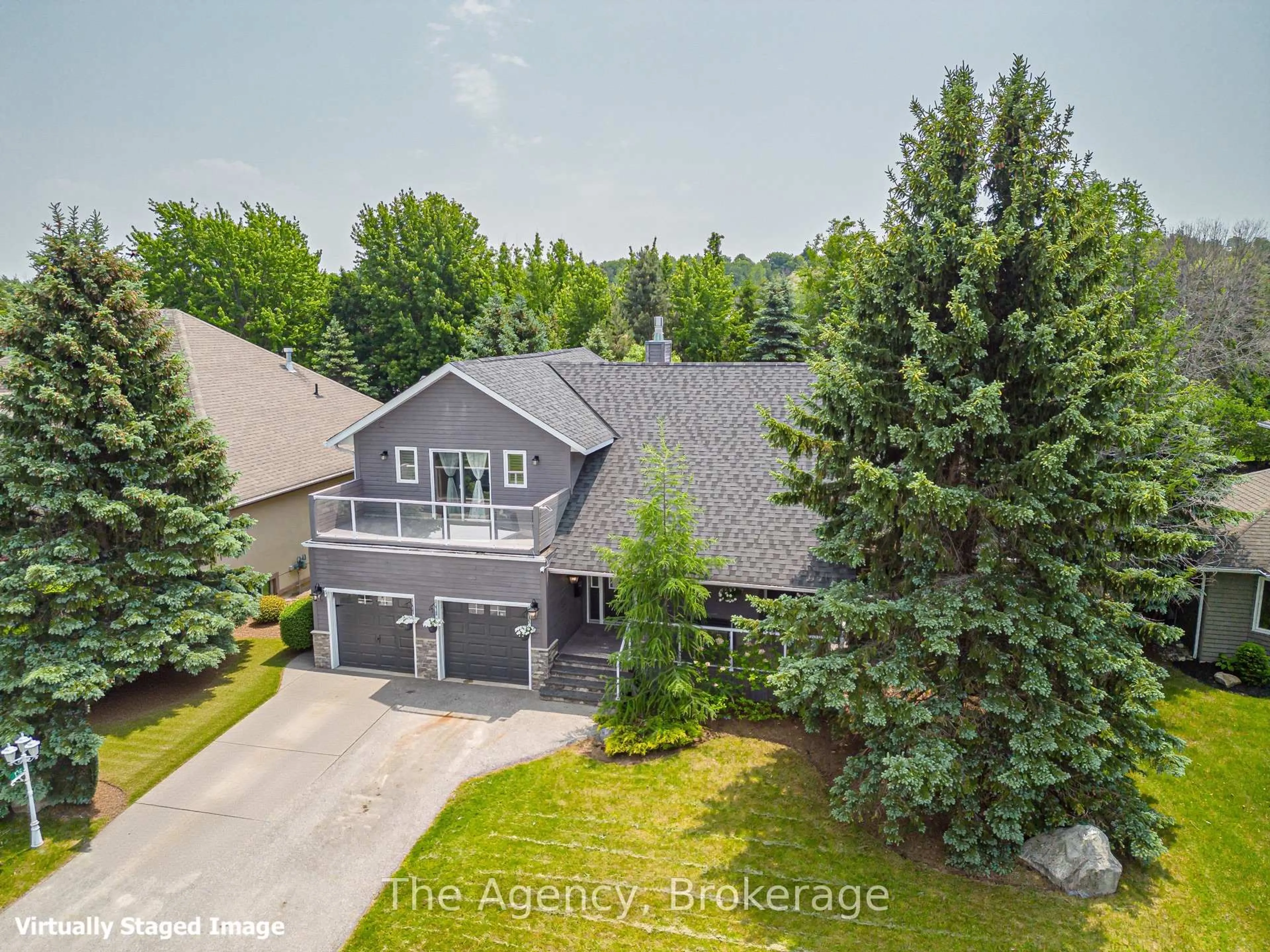 A pic from outside/outdoor area/front of a property/back of a property/a pic from drone, forest/trees view for 136 Grand Cypress Lane, Blue Mountains Ontario L9Y 0K7