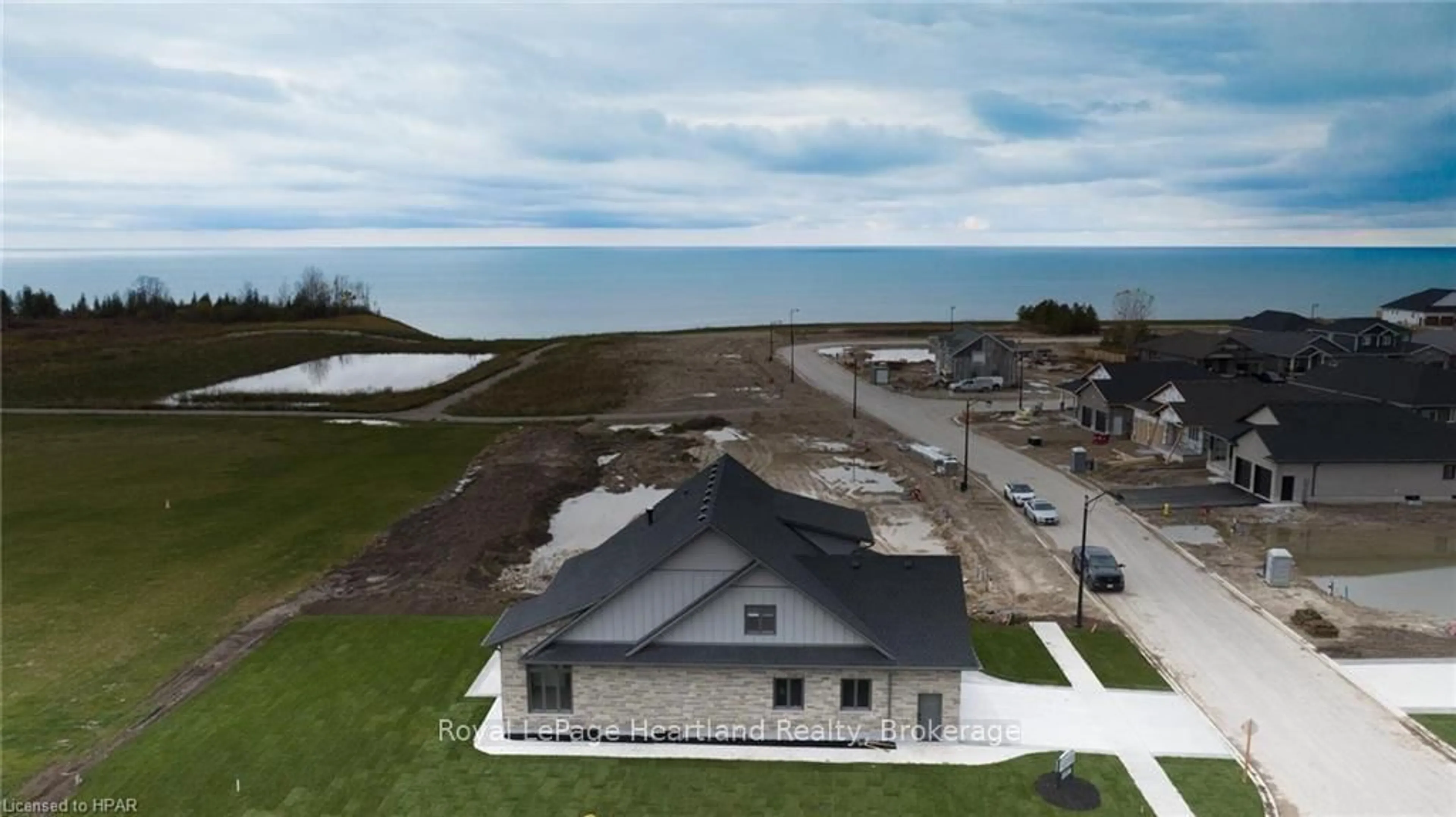 A pic from outside/outdoor area/front of a property/back of a property/a pic from drone, water/lake/river/ocean view for 171 KINGFISHER Lane, Goderich Ontario N7A 0C8
