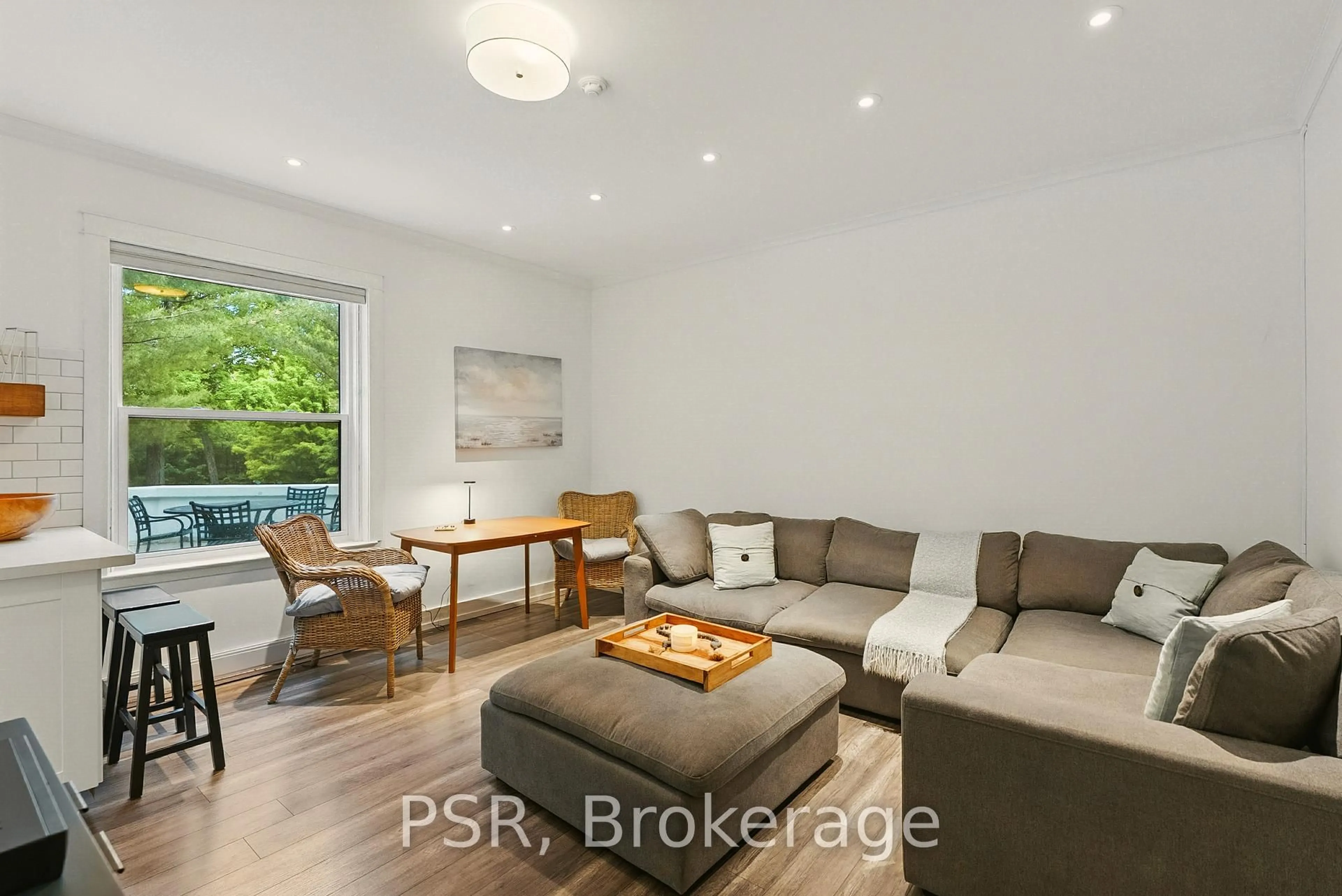 Living room with furniture, wood/laminate floor for 12 Bigwin Island #118, Lake of Bays Ontario P0B 1A0