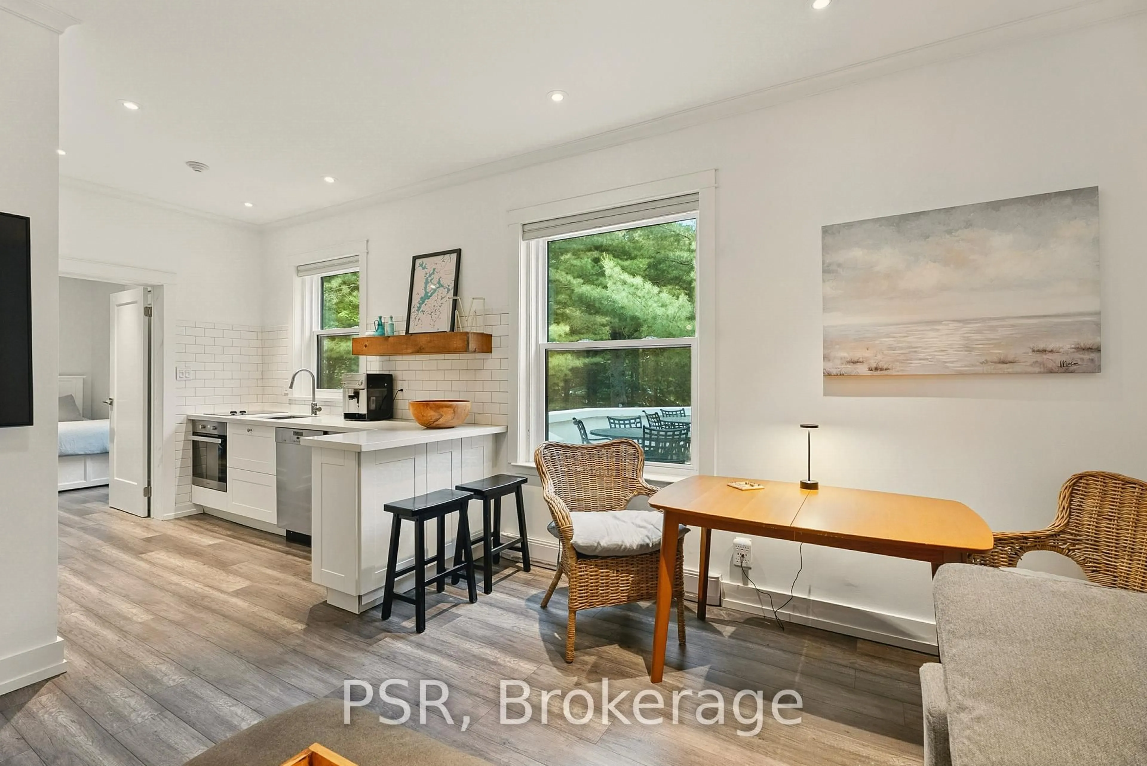 Open concept kitchen, wood/laminate floor for 12 Bigwin Island #118, Lake of Bays Ontario P0B 1A0