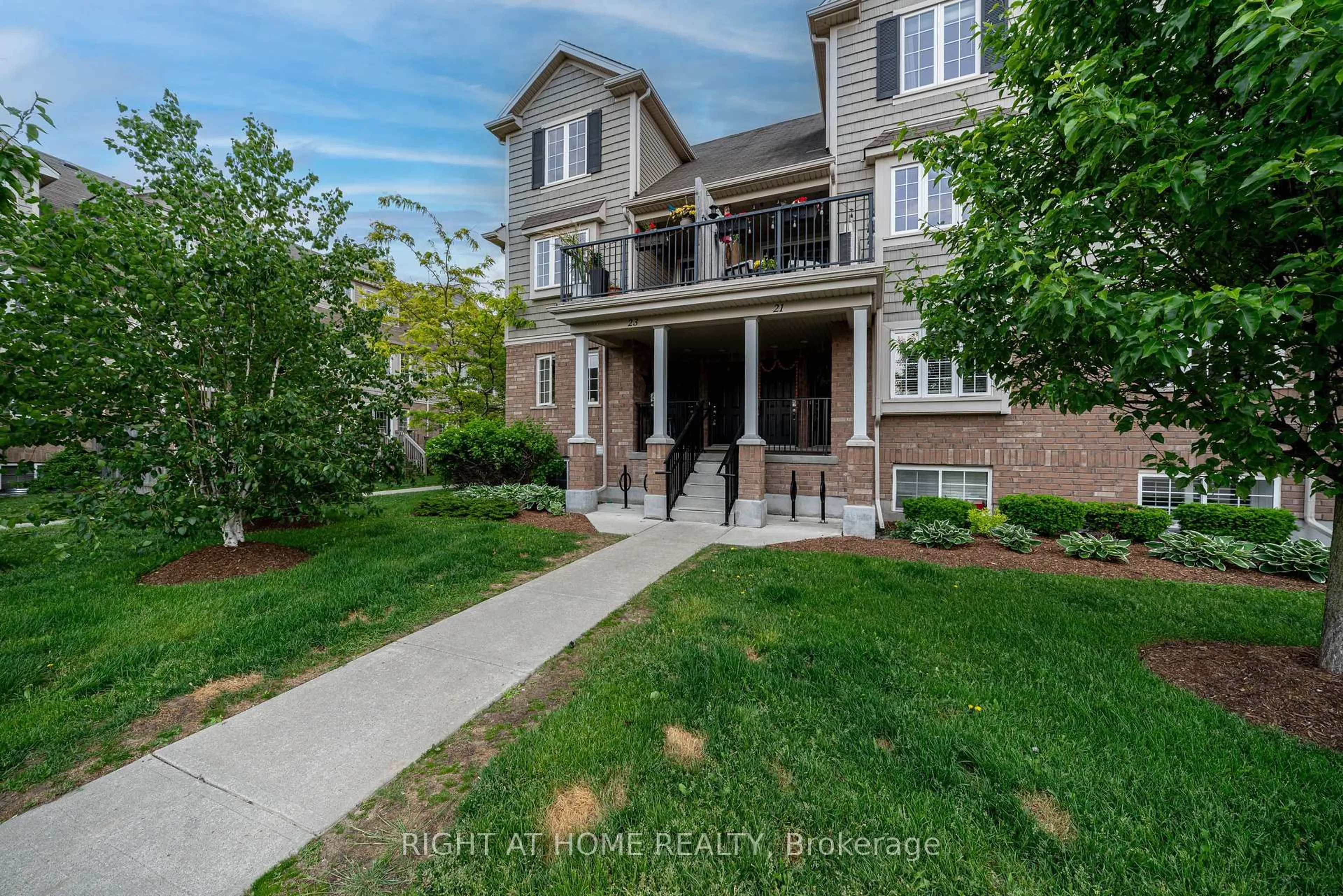A pic from outside/outdoor area/front of a property/back of a property/a pic from drone, street for 15 Carere Cres #23B, Guelph Ontario N1E 0K4