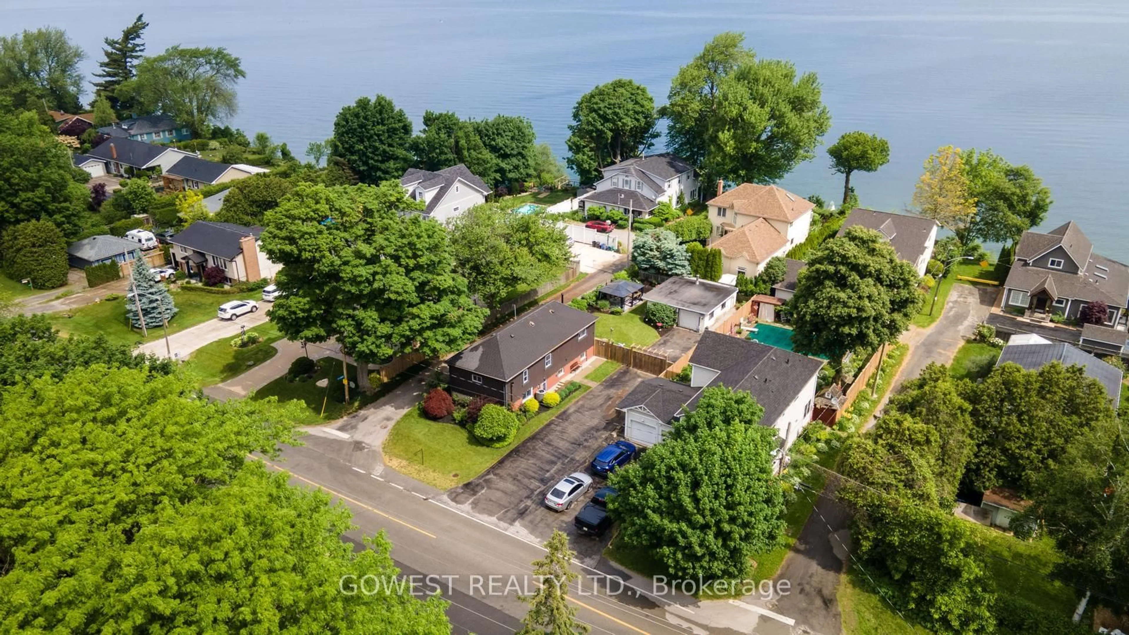 A pic from outside/outdoor area/front of a property/back of a property/a pic from drone, water/lake/river/ocean view for 223 Lake St, Grimsby Ontario L3M 2B1