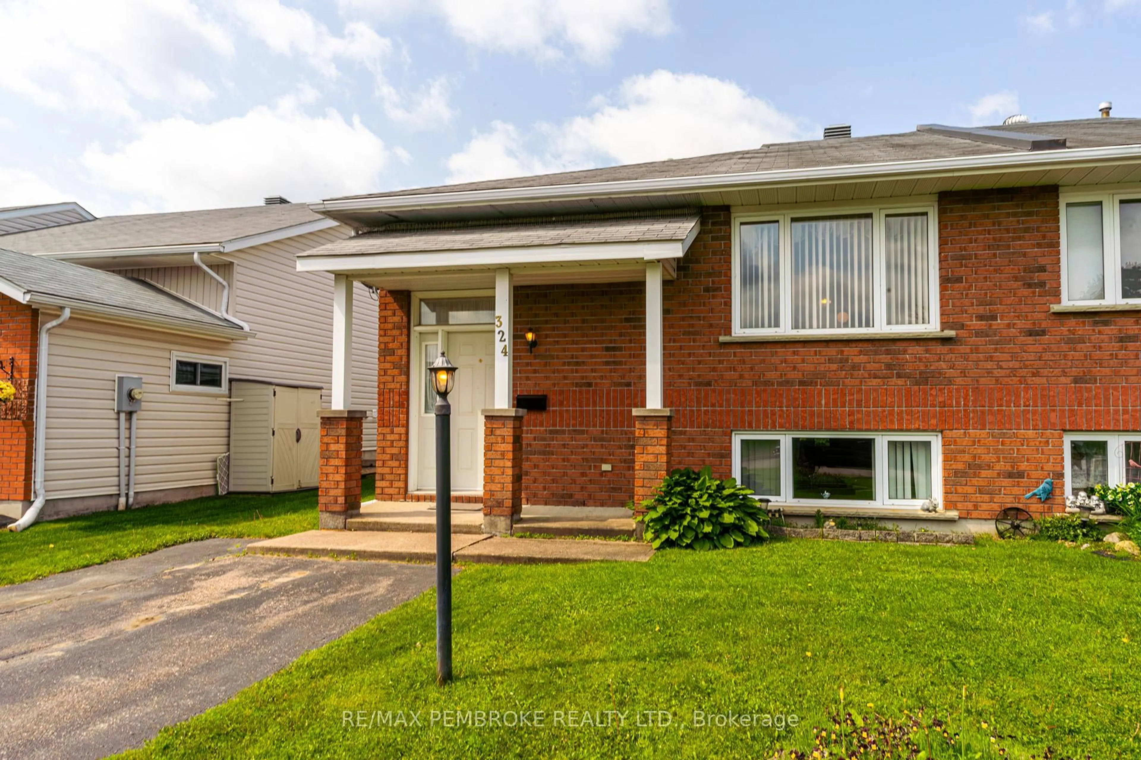 Home with brick exterior material, street for 324 Matheson Dr, Pembroke Ontario K8A 8M2