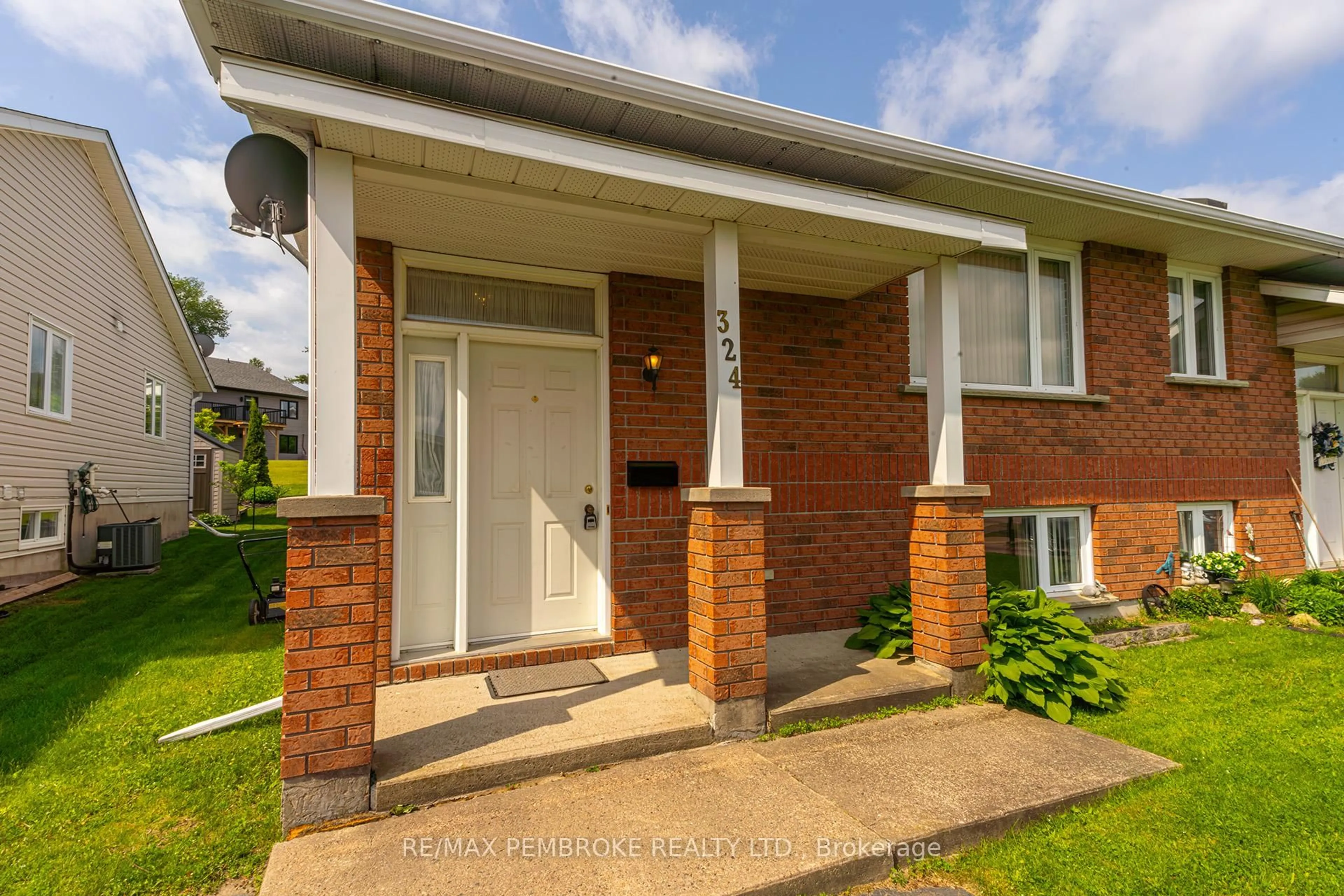 Home with brick exterior material, street for 324 Matheson Dr, Pembroke Ontario K8A 8M2