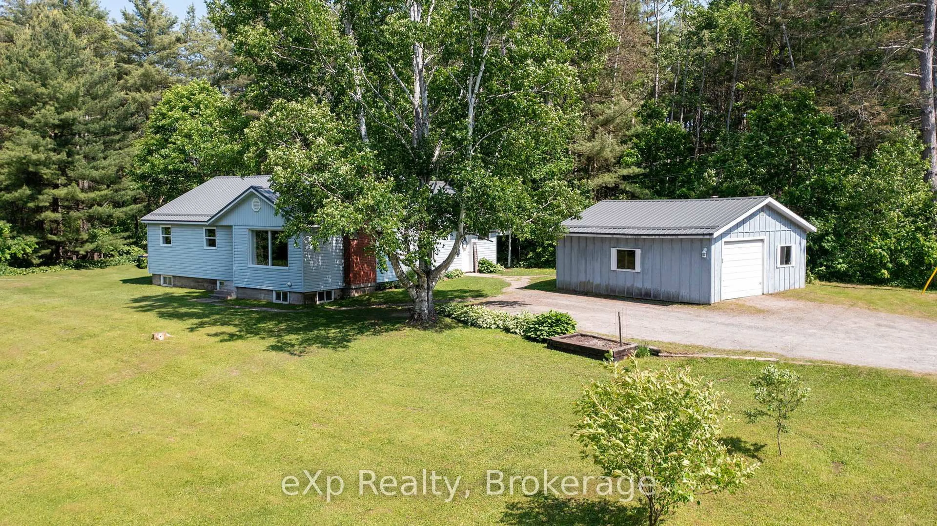 A pic from outside/outdoor area/front of a property/back of a property/a pic from drone, street for 92 James Bay Jct Rd, Seguin Ontario P2A 0B2