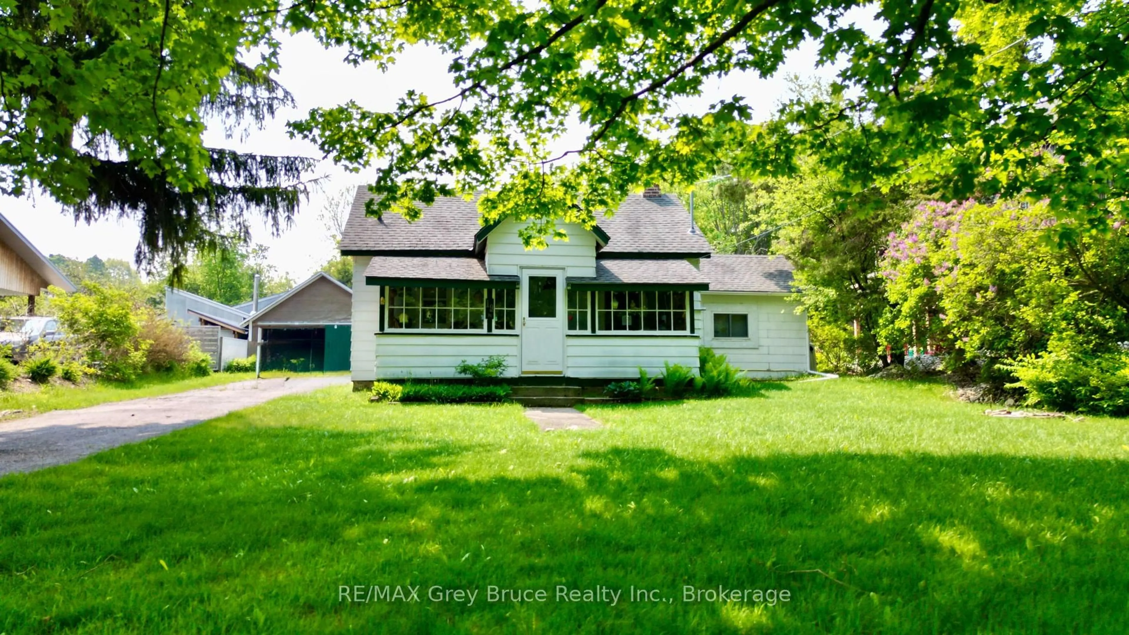 A pic from outside/outdoor area/front of a property/back of a property/a pic from drone, street for 19 Mill St, Northern Bruce Peninsula Ontario N0H 1W0