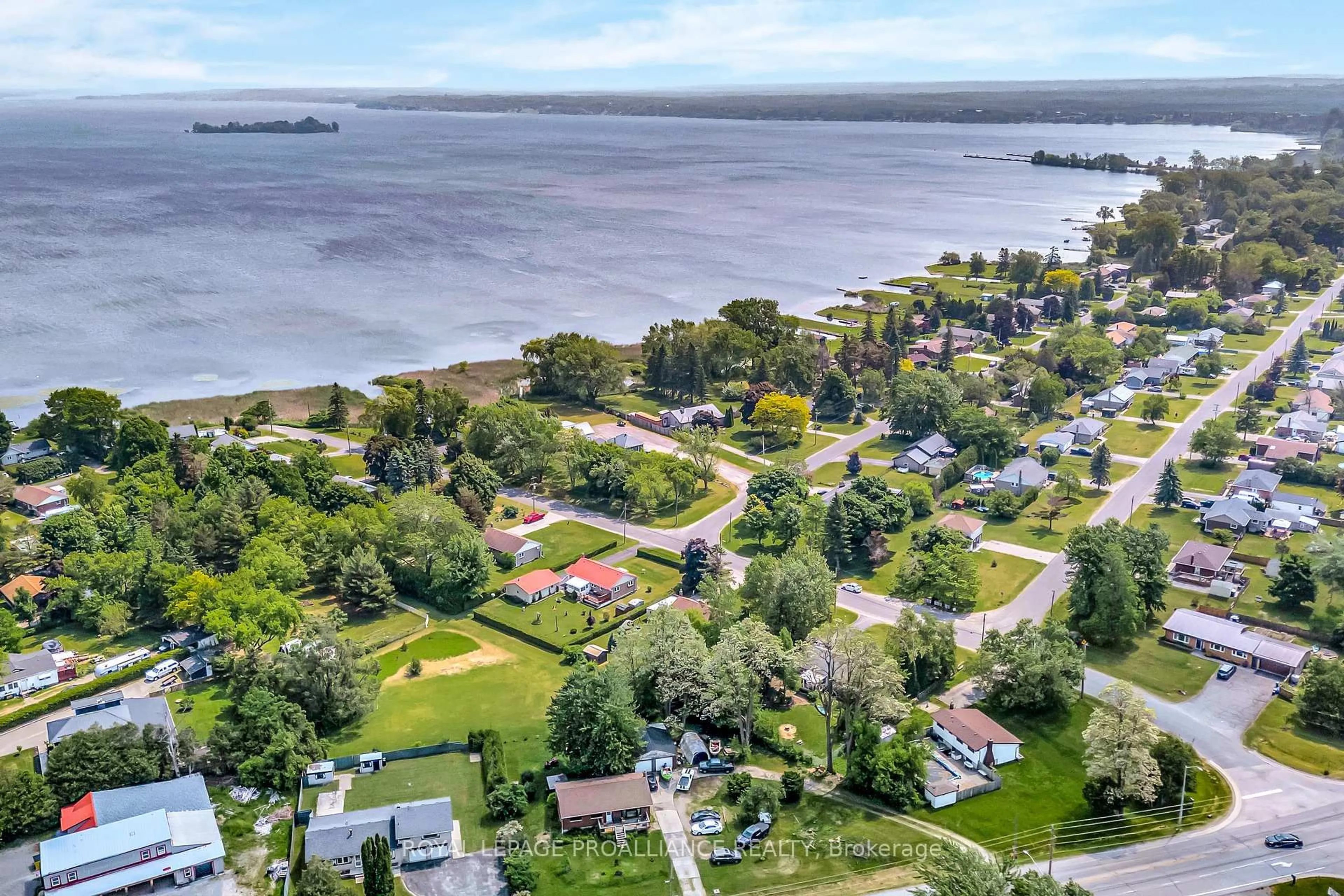 A pic from outside/outdoor area/front of a property/back of a property/a pic from drone, water/lake/river/ocean view for 6 Bayside Dr, Quinte West Ontario K0K 1L0