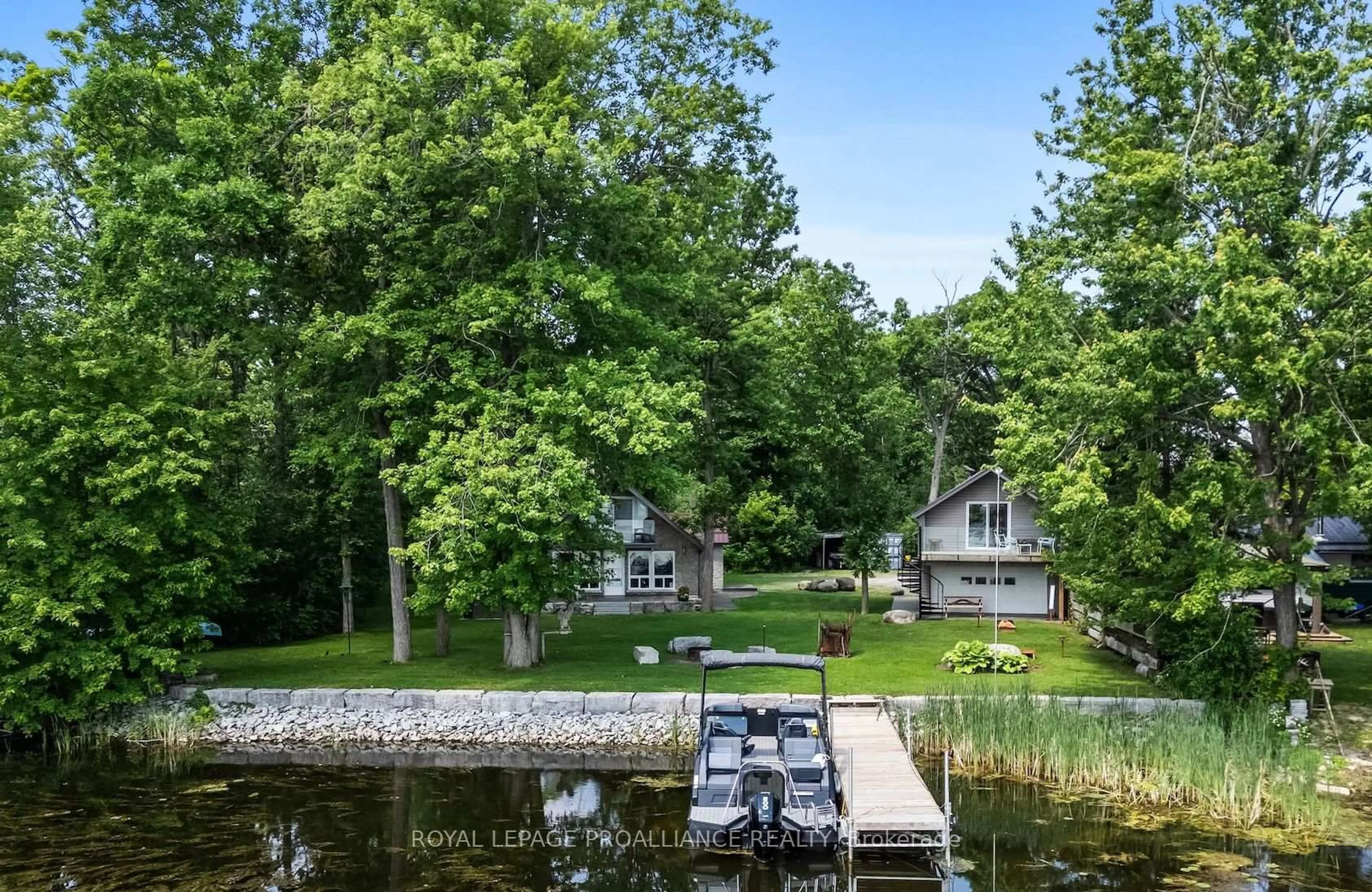 A pic from outside/outdoor area/front of a property/back of a property/a pic from drone, water/lake/river/ocean view for 52 Lodge Rd #C, Trent Hills Ontario K0L 1L0