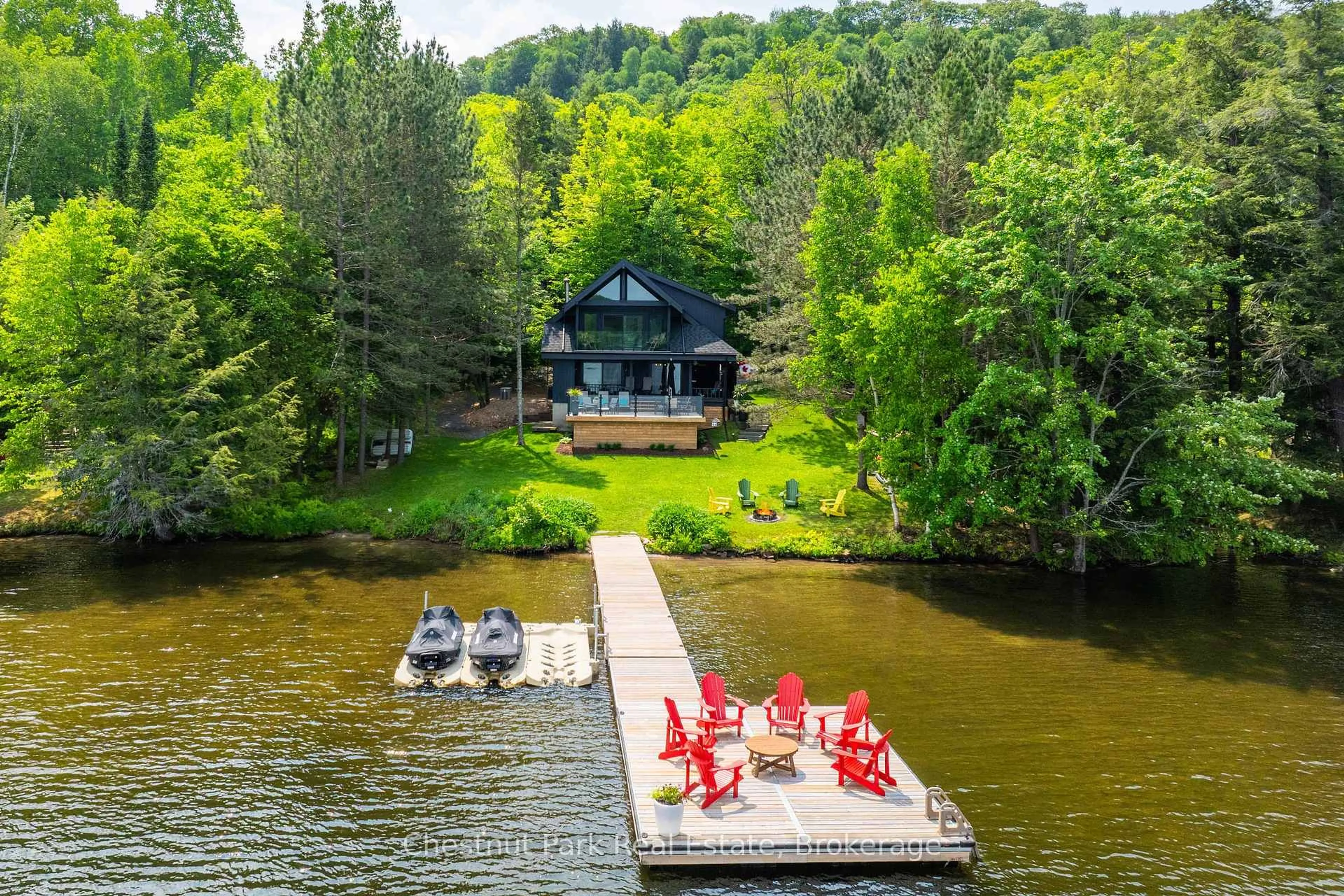 A pic from outside/outdoor area/front of a property/back of a property/a pic from drone, water/lake/river/ocean view for 1167 Wolf Bay Rd, Lake of Bays Ontario P1H 2J6
