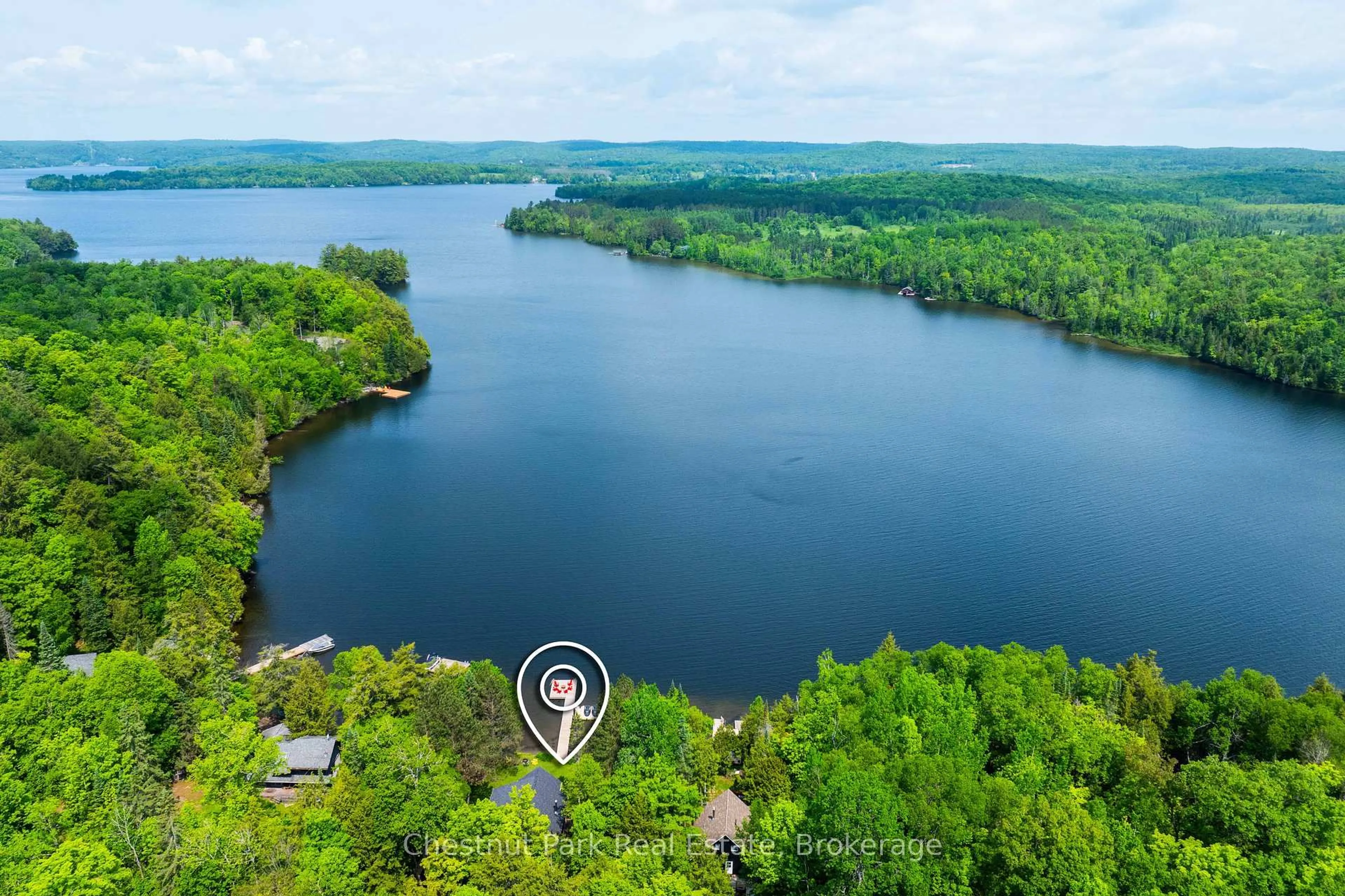 A pic from outside/outdoor area/front of a property/back of a property/a pic from drone, water/lake/river/ocean view for 1167 Wolf Bay Rd, Lake of Bays Ontario P1H 2J6