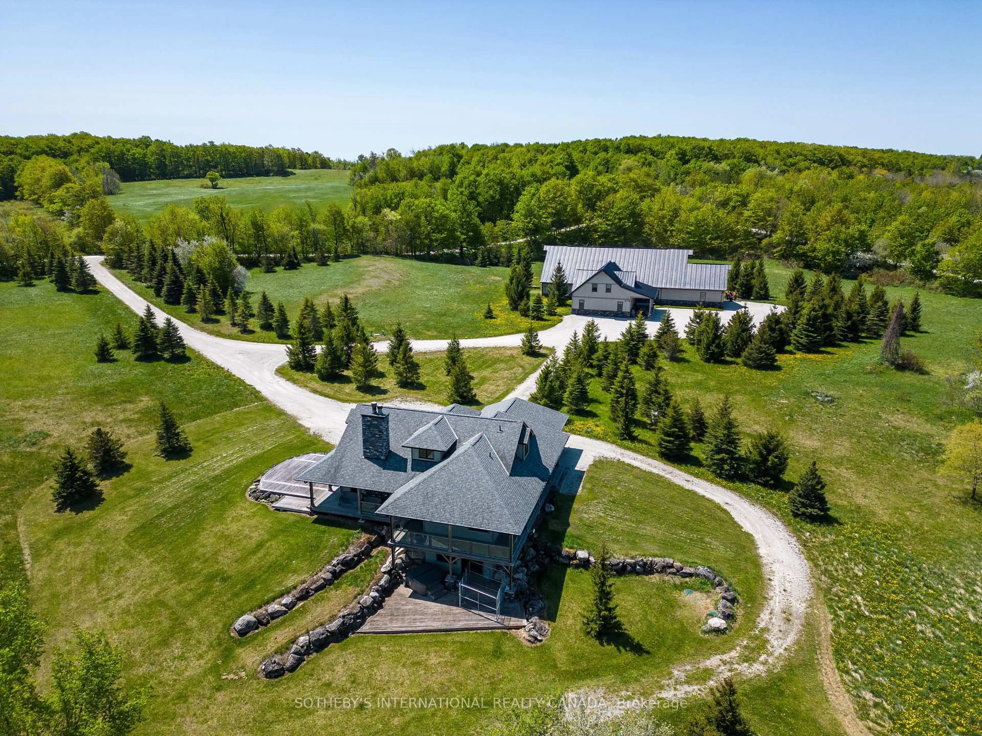 A pic from outside/outdoor area/front of a property/back of a property/a pic from drone, mountain view for 569593 Sideroad 6 Sdrd, Blue Mountains Ontario N0H 2E0