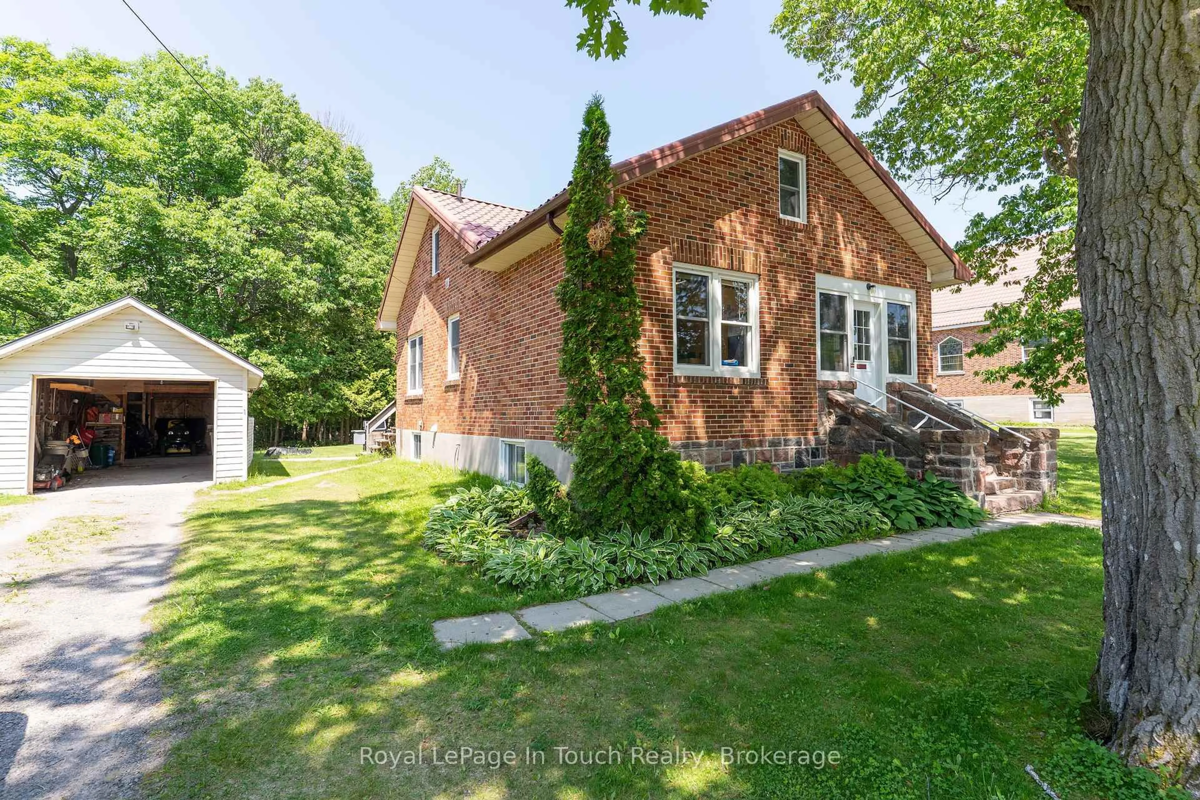 Home with brick exterior material, street for 2596 Honey Harbour Rd, Georgian Bay Ontario P0E 1E0