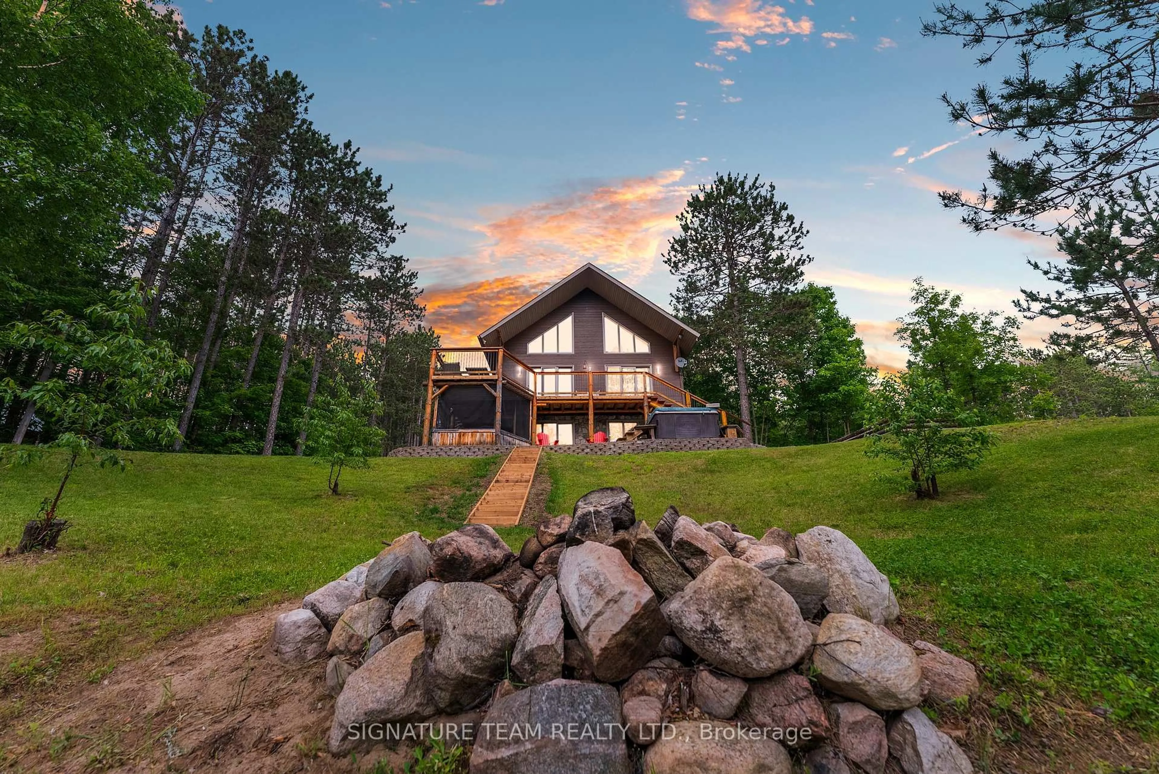 A pic from outside/outdoor area/front of a property/back of a property/a pic from drone, mountain view for 65b Recoskie Lane, Killaloe Ontario K0J 2A0