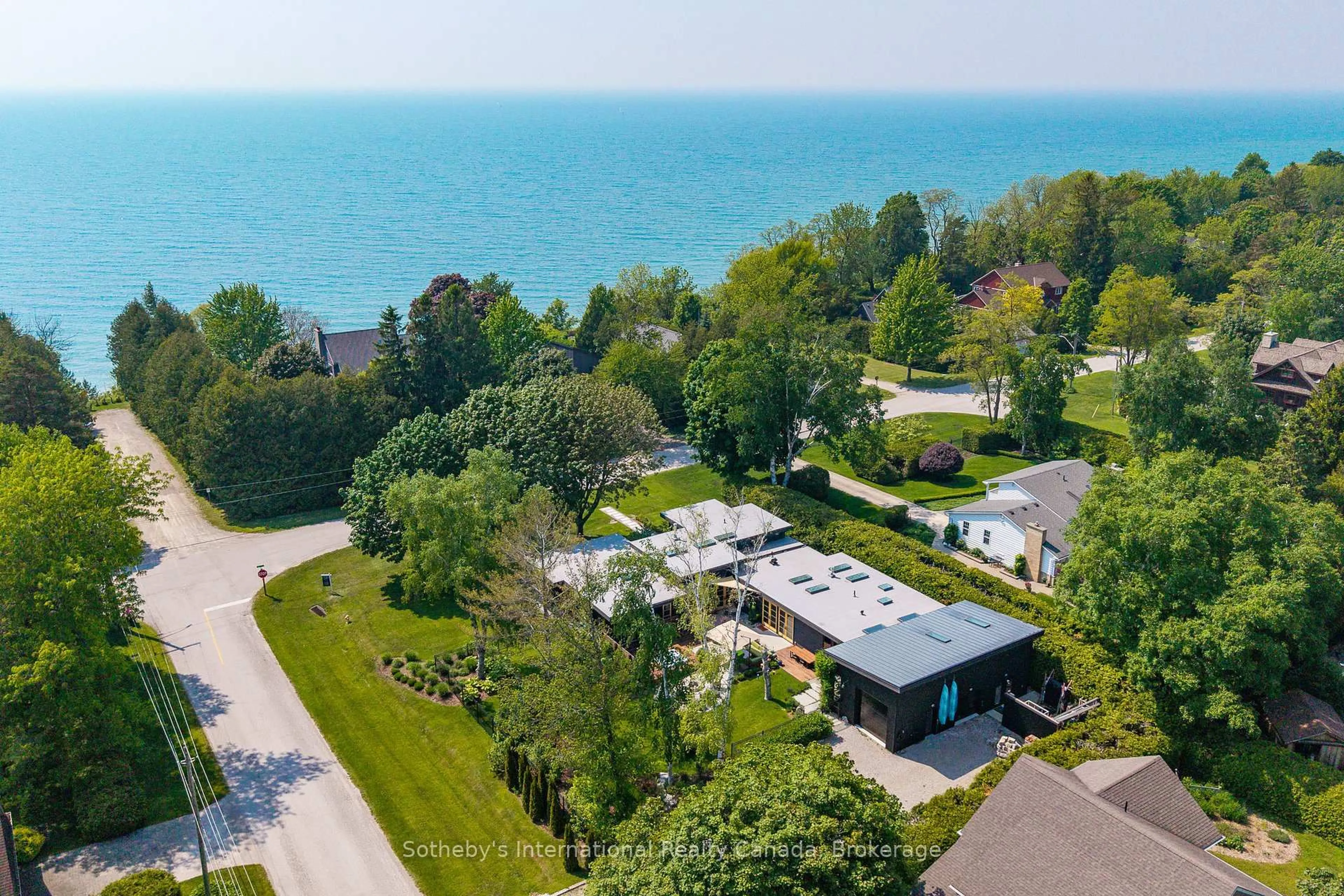 A pic from outside/outdoor area/front of a property/back of a property/a pic from drone, water/lake/river/ocean view for 62 Tuyll St, Bluewater Ontario N0M 1G0